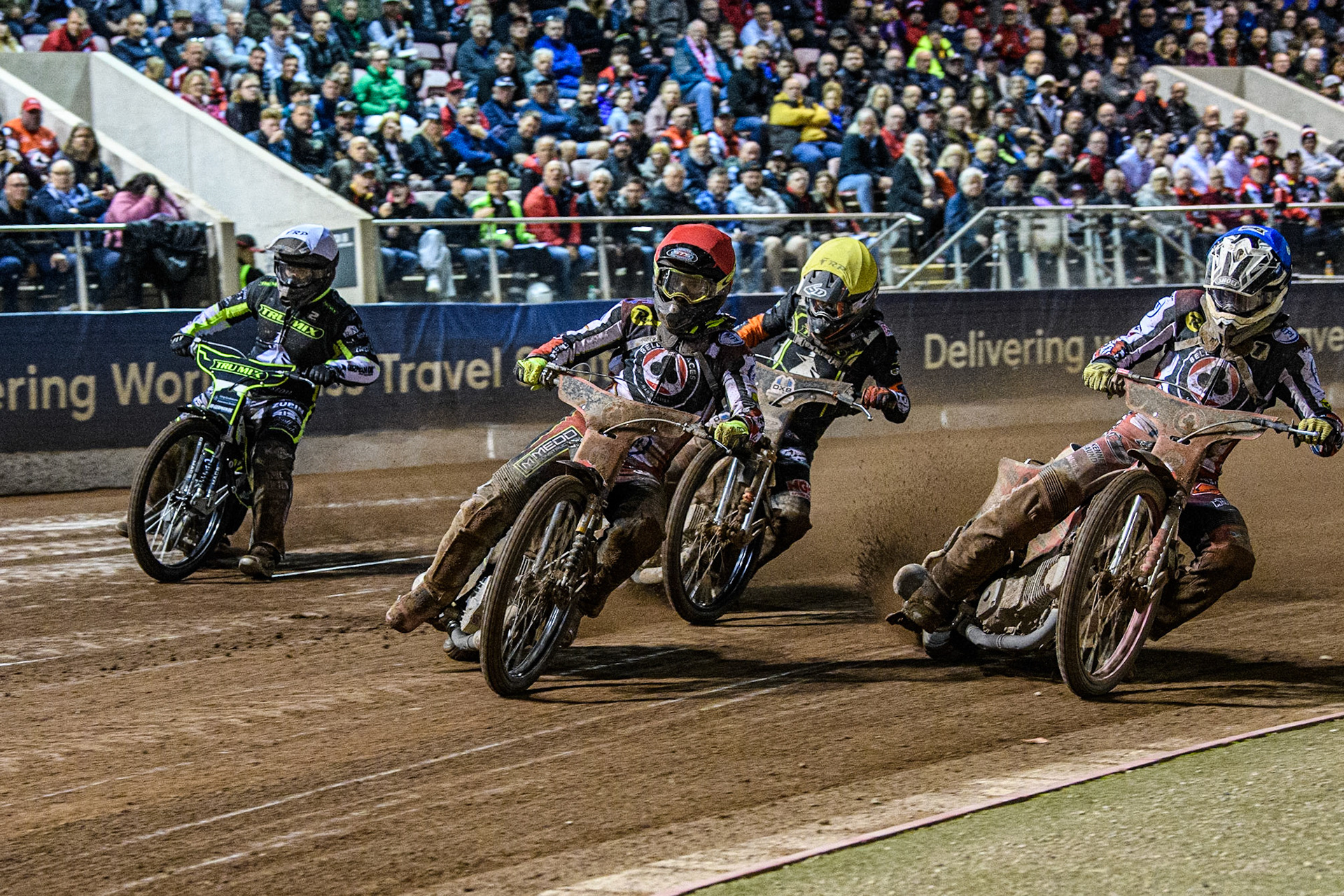 Tom Brennan (Red) and Connor Bailey (Blue) make the gate over Erik Riss (White) and Jack Smith (Yellow) during the Sports Insure Premiership Semi Final Playoff 2nd leg match between Belle Vue Aces and Ipswich Witches at the National Speedway Stadium, Manchester on Monday 25th September 2023. (Photo: Ian Charles | MI News)