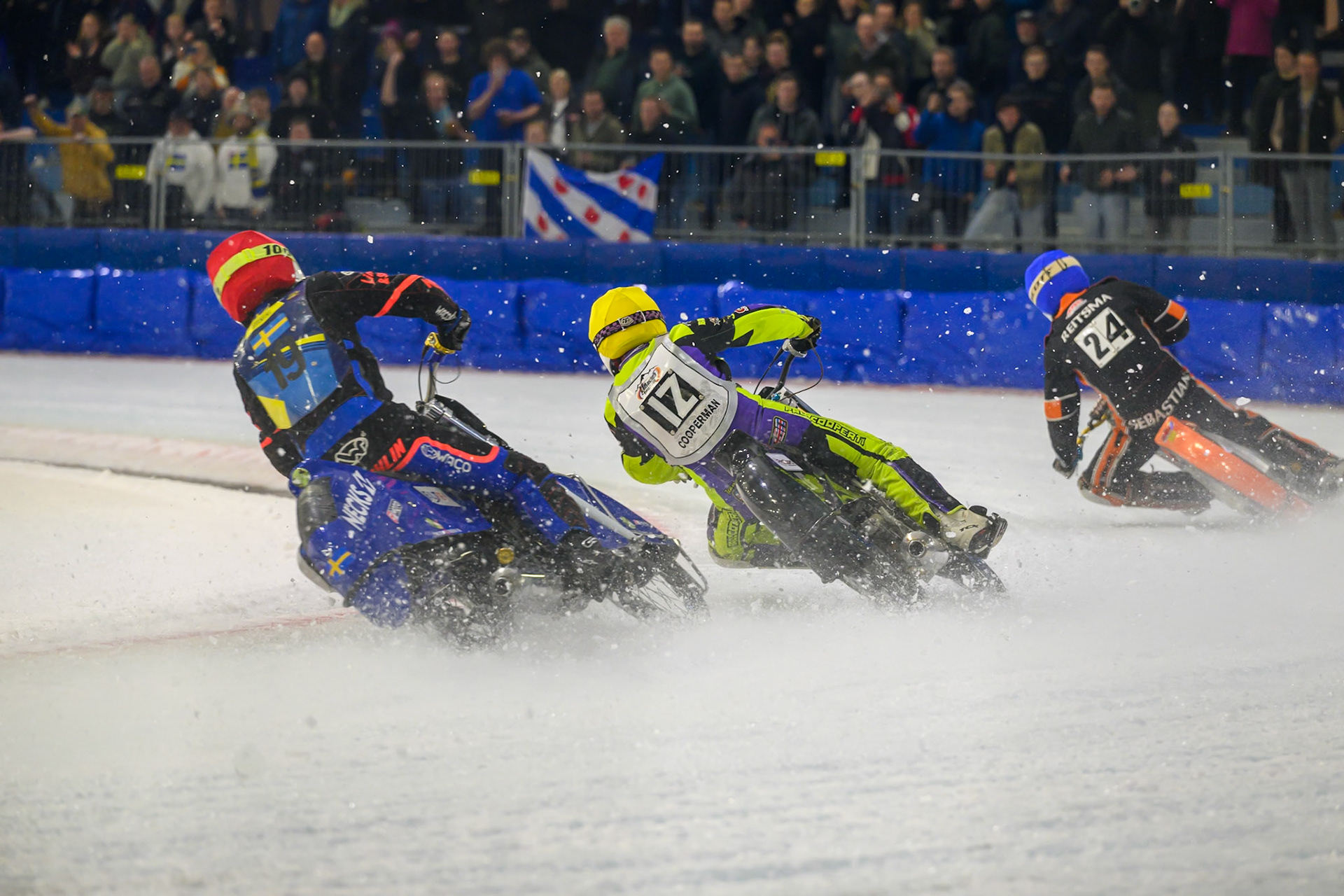 Melwin Björklin of Sweden  in Red chases Paul Cooper of Great Britain in Yellow and Sebastian Reitsma of The Netherlands  in Blue during the ROELOF THIJS BOKAAL at Ice Rink Thialf, Heerenveen on Friday 10th April 2026.  (Photo: Ian Charles | MI News)
