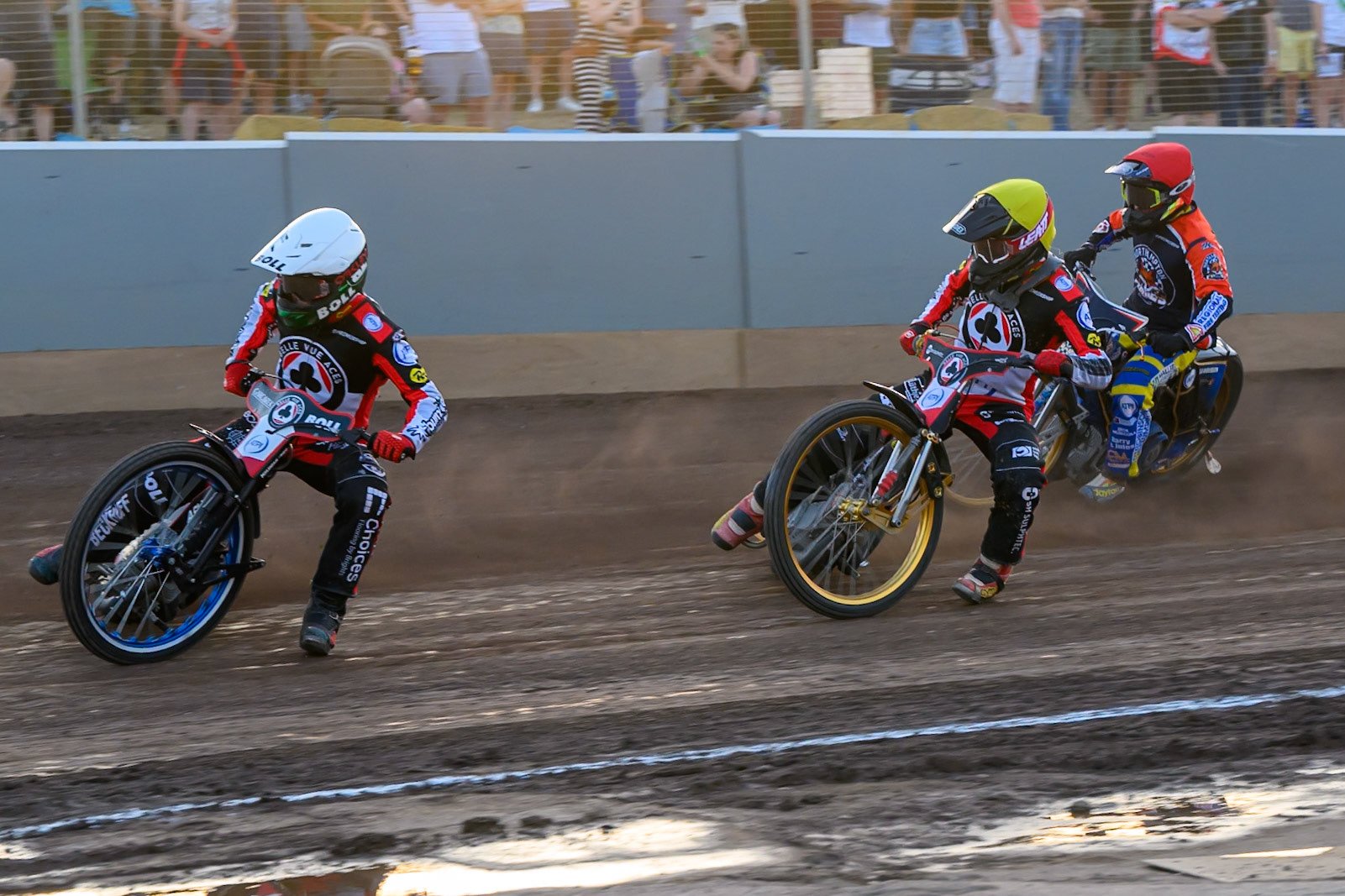 Brady Kurtz of Belle Vue Aces  in White and Norick Blodorn of Belle Vue Aces  in Yellow leading Justin Sedgmen Guest Rider for Northampton Foxes in Red during the Rowe Motor Oil Premiership match between Northampton Foxes and Belle Vue Aces at Northampton International Shaleway, Northampton on Thursday 13th August 2026. (Photo: Ian Charles | MI News)