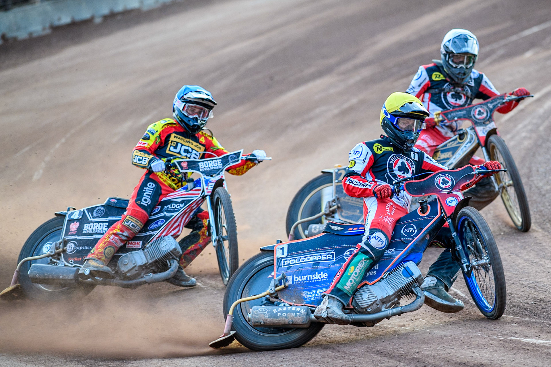 Belle Vue Aces' Brady Kurtz in Yellow leading Leicester Lions' Luke Becker in Blue and Belle Vue Aces' Norick Blodorn in White during the Rowe Motor Oil Premiership match between Leicester Lions and Belle Vue Aces at the Pidcock Motorcycles Arena, Leicester on Thursday 25th July 2024. (Photo: Ian Charles | MI News)