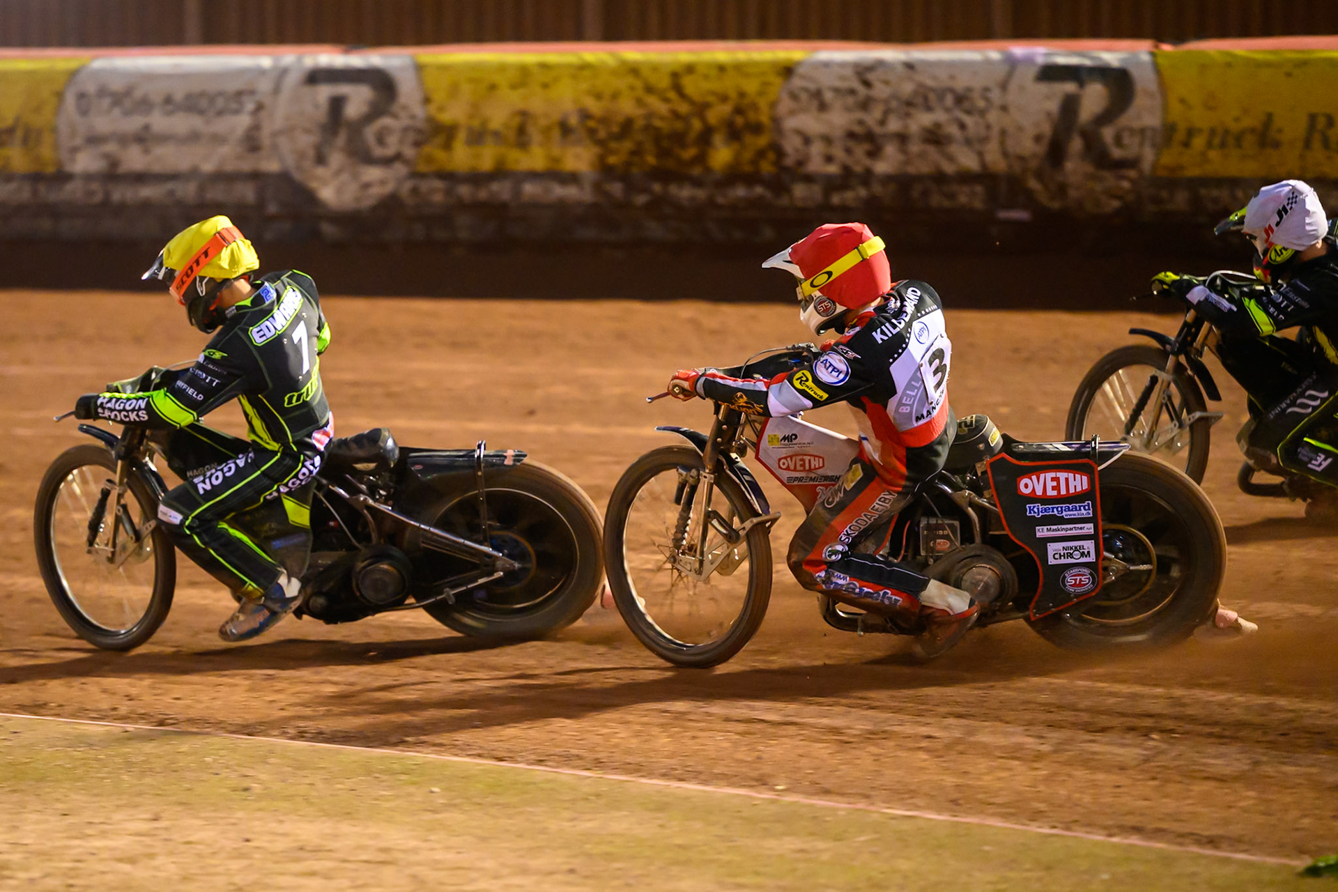 Peter Kildemand of Belle Vue Aces  in Red chases Jason Edwards of Ipswich Witches  in Yellow during the Rowe Motor Oil Premiership match between Belle Vue Aces and Ipswich Witches at the National Speedway Stadium, Manchester on Monday 20th April 2026. (Photo: Ian Charles | MI News)