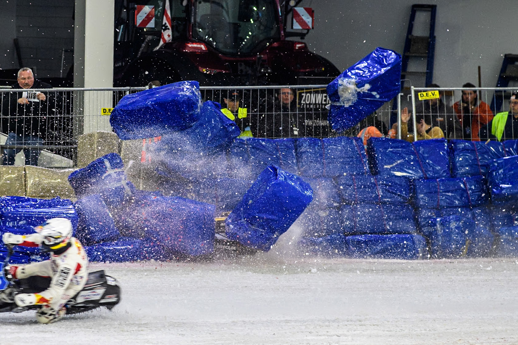 Germany's Max Niedermaier (88) crashes into the bales during the FIM Ice Speedway Gladiators World Championship Final 4 at Ice Rink Thialf, Heerenveen on Sunday 7th April 2024. (Photo: Ian Charles | MI News)