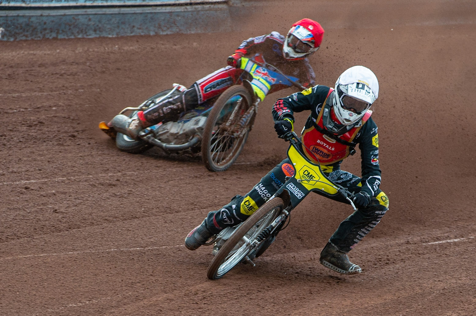 MANCHESTER, UK. JULY 2ND  Daniel Gilkes  (White) leads Benji Compton  (Red) during the National Development League match between Belle Vue Colts and Kent Royals at the National Speedway Stadium, Manchester on Friday 2nd July 2021. (Credit: Ian Charles | MI News)