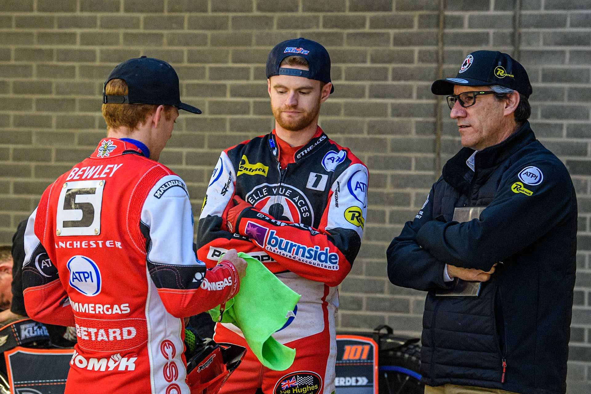 (L to R) Belle Vue Aces' Brady Kurtz, Belle Vue Aces' Brady Kurtz and Belle Vue Aces' Team Manager Mark Lemon  during the Rowe Motor Oil Premiership match between Belle Vue Aces and King's Lynn Stars at the National Speedway Stadium, Manchester on Monday 20th May 2024. (Photo: Ian Charles | MI News)