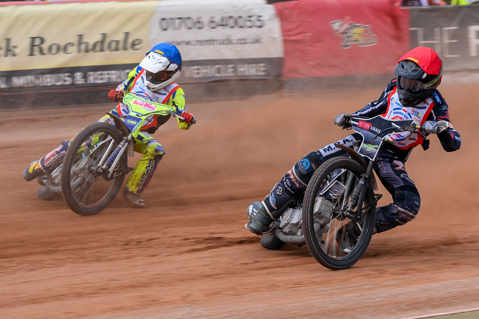 BRITISH YOUTH CHAMPIONSHIP (500cc): Seth Norman (6) in Red rides inside Harry Fletcher (23) in Blue during the British Youth Speedway Championship at the National Speedway Stadium, Manchester on Sunday 10th May 2026. (Photo: Ian Charles | MI News)