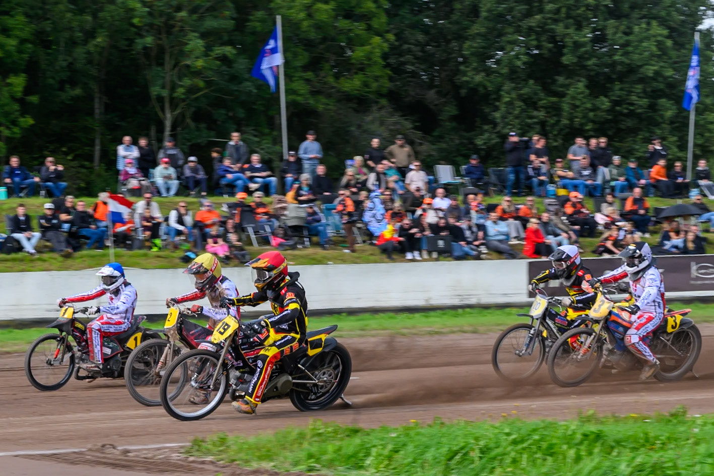Lukas Fienhage (19) of Germany on the inside of Patrick Kruse (2) of Denmark in Yellow , Kenneth Kruse Hansen (1) of Denmark, \with Jacob Bukhave (3) of Denmark in Black &amp; White and Timo Wachs (20) of Germany in White  behind during the FIM Long Track of Nations 2026 at the Speed Centre Roden in the Netherlands on Sunday 20th September 2026. (Photo: Ian Charles | MI News)