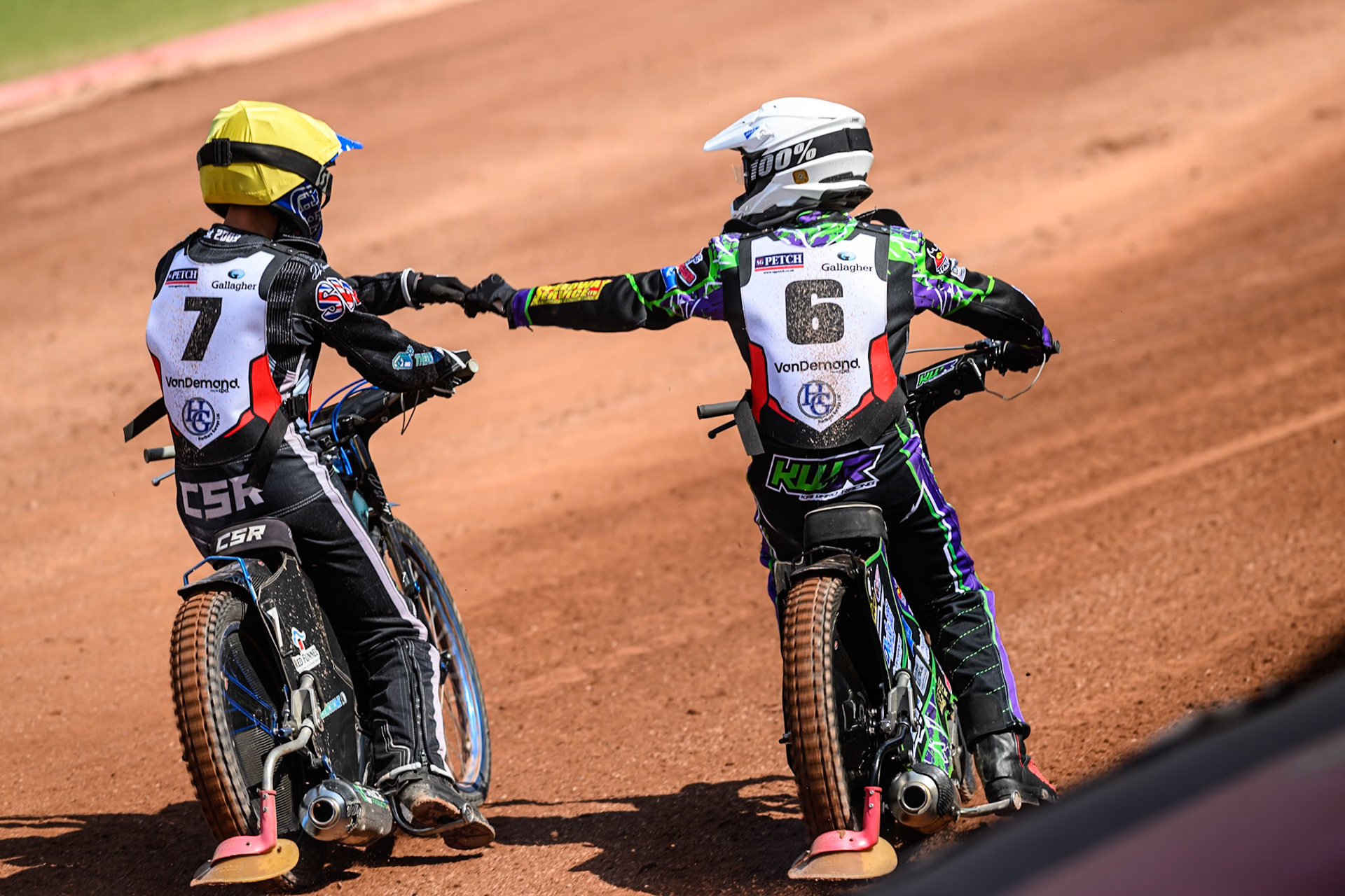 Kai Ward of Middlesborough Tigers  in White and Charlie Southwick of Middlesborough Tigers in Yellow celebrate their maximum points heat win during the WSRA National Development League match between Belle Vue Colts and Middlesbrough Tigers at the National Speedway Stadium, Manchester on Sunday 10th August 2025. (Photo: Mark Fletcher | MI News)