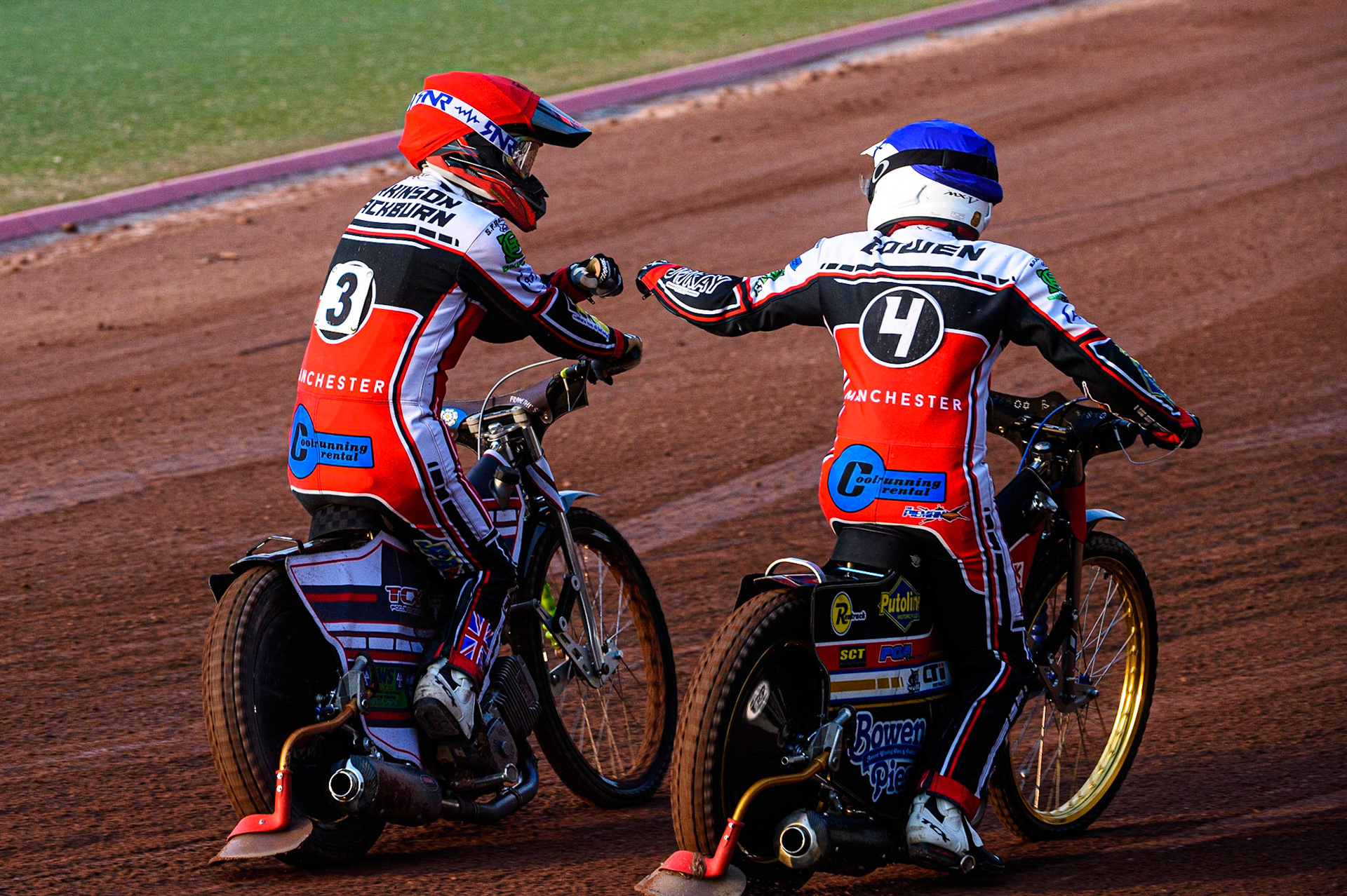 MANCHESTER, UK. JULY 23RD  Jack Parkinson-Blackburn  (Red) and Paul Bowen  (Blue) celebrate their maximum points heat win during the National Development League match between Belle Vue Colts and Eastbourne Seagulls at the National Speedway Stadium, Manchester on Friday 23rd July 2021. (Credit: Ian Charles | MI News)