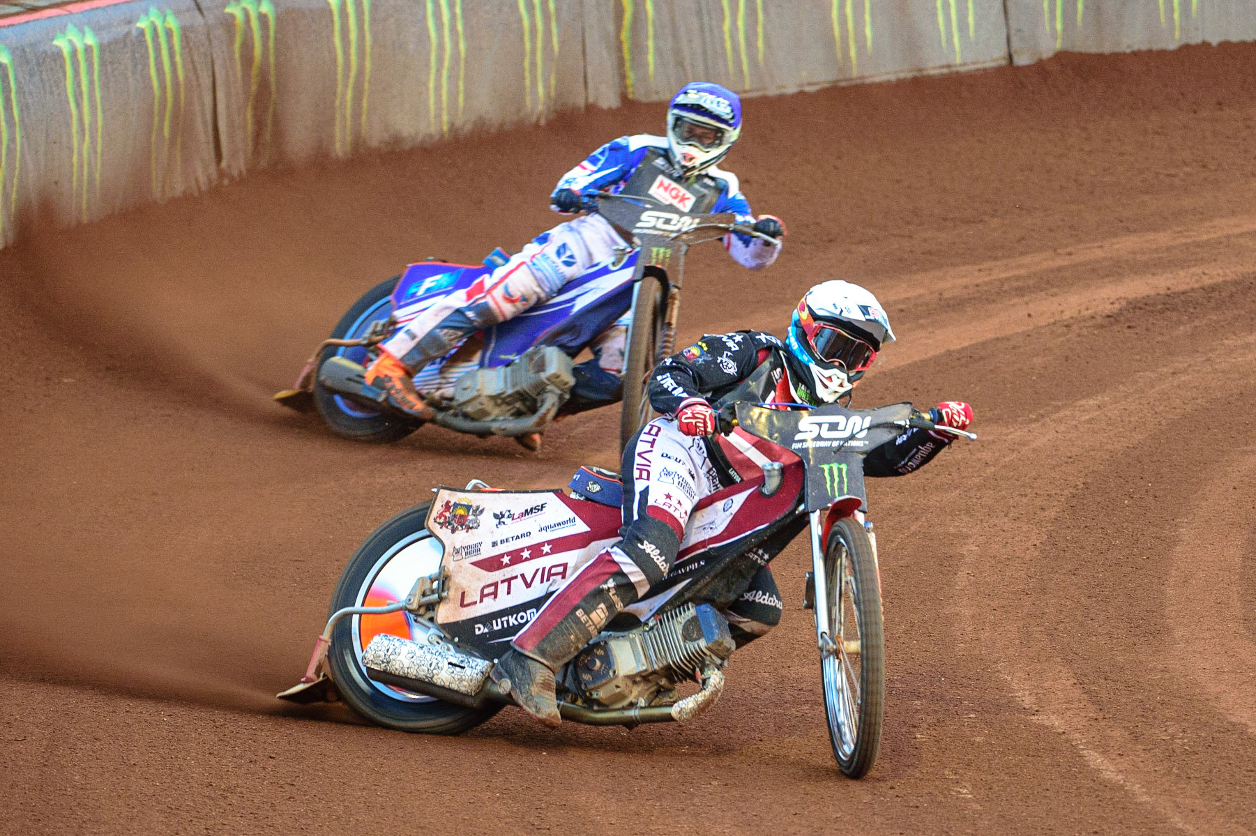MANCHESTER, UK. OCT 16TH Andzejs Lebedevs of Latvia (White) leads Dmitri Berge of France (Blue) during the Monster Energy FIM Speedway of Nations at the National Speedway Stadium, Manchester on Saturday  16th October 2021. (Credit: Ian Charles | MI News)