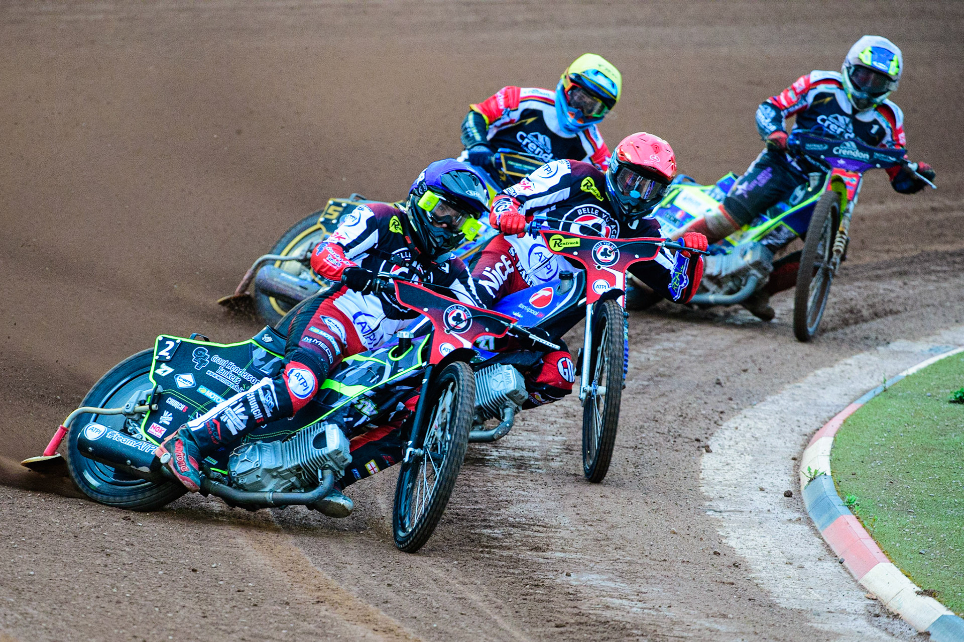 Tom Brennan (Blue) leads Matej Zagar (Red) Justin Sedgmen (Yellow) and Chris Harris  (White) during the SGB Premiership match between Belle Vue Aces and Peterborough at the National Speedway Stadium, Manchester on Monday 25th July 2022. (Credit: Ian Charles | MI News