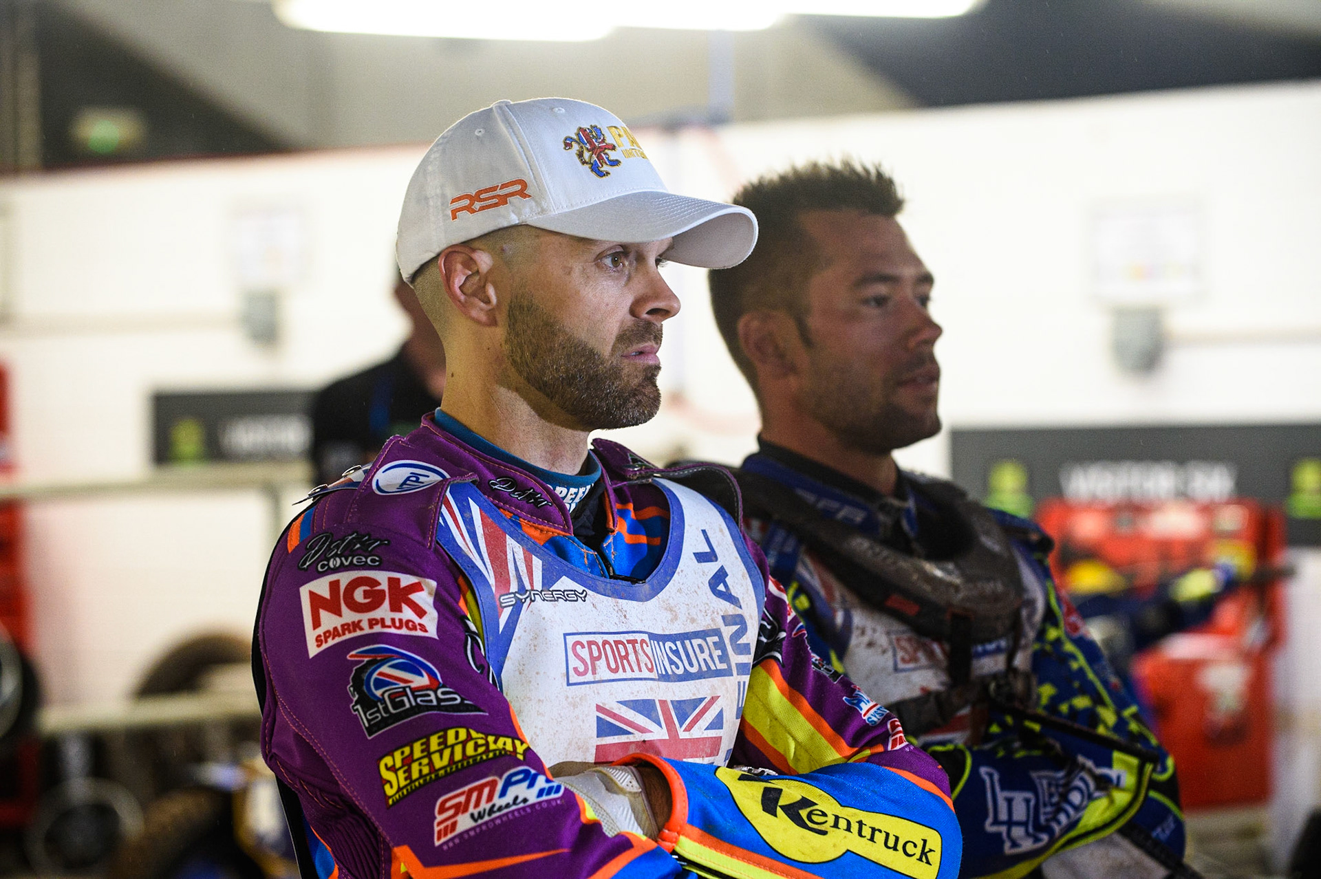 MANCHESTER, UK. AUGUST 16TH   Rory Schlein (left) and Paul Starke  watch the meeting on the Eurosport Monitor during the Sports Insure British Speedway Finals at the National Speedway Stadium, Manchester on Monday 16th August 2021. (Credit: Ian Charles | MI News)