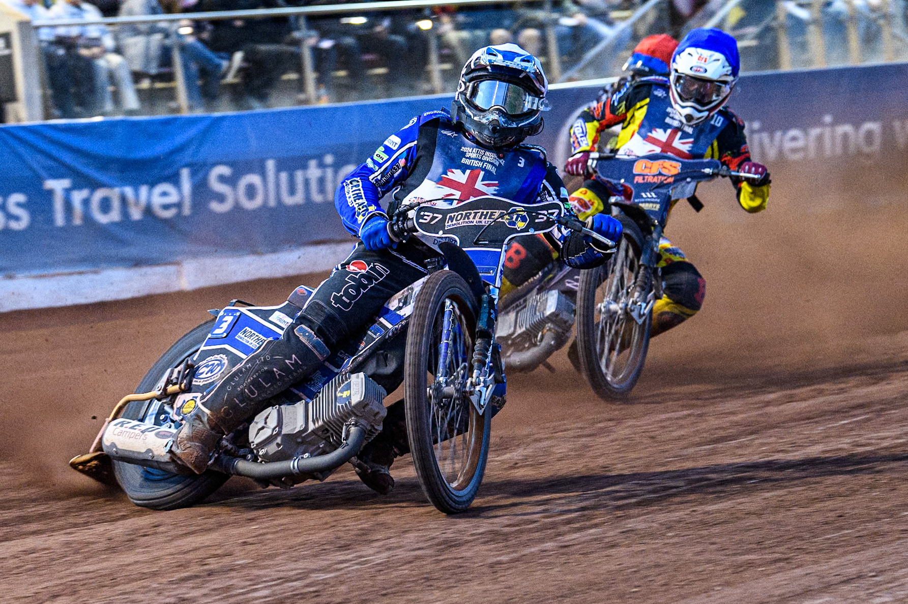 Chris Harris in White leading Steve Worrall in Blue in the semi final during the Attis Insurance Sports Division British Speedway Championship Final at the National Speedway Stadium, Manchester on Saturday 8th June 2024. (Photo: Ian Charles | MI News)