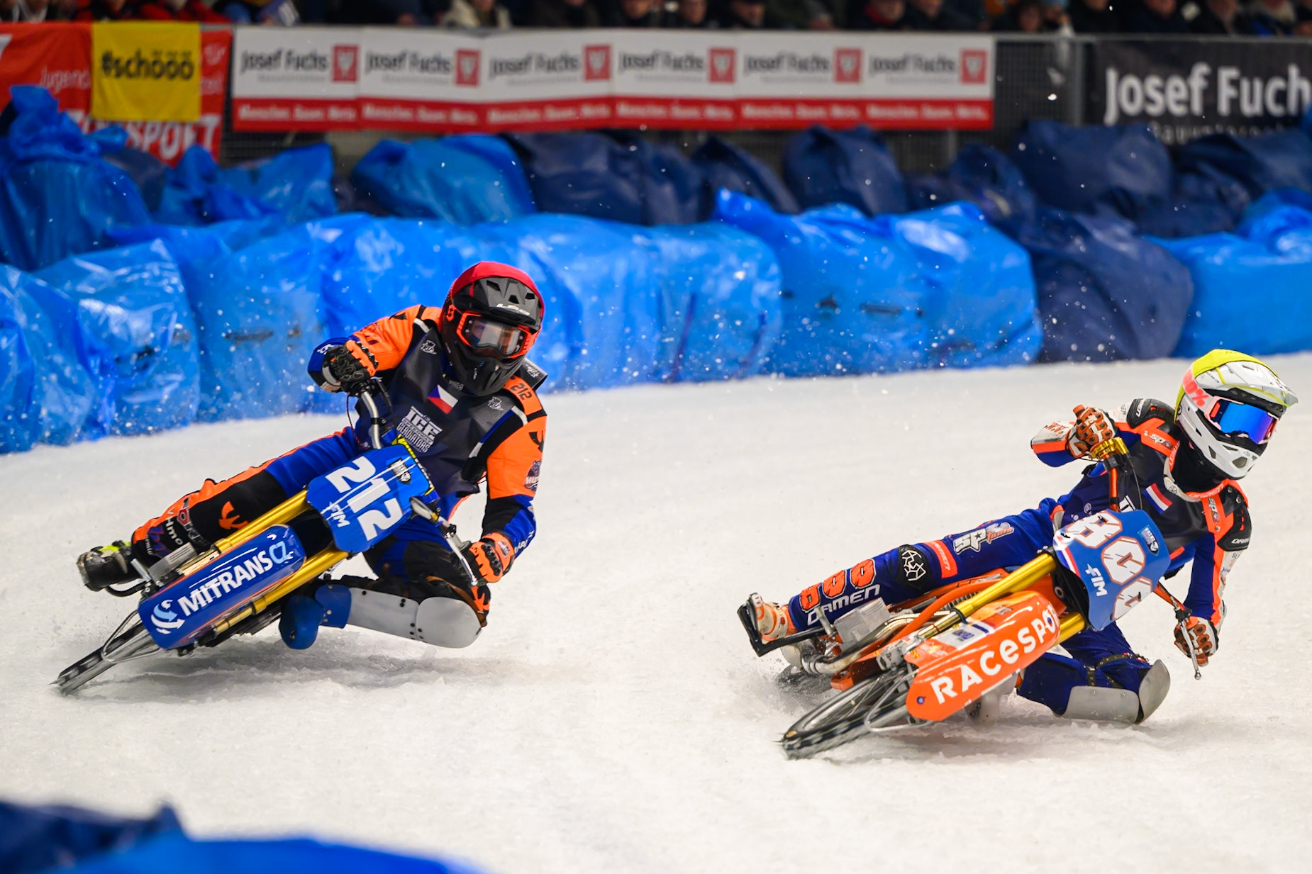 Jasper Iwema (800) of The Netherlands  in White rides inside Lukas Hutla (212) of Czechia  in Red during the Ice Speedway Gladiators World Championship Final 1 at Max-Aicher-Arena, Inzell on Saturday 14th March 2026. (Photo: Ian Charles | MI News)