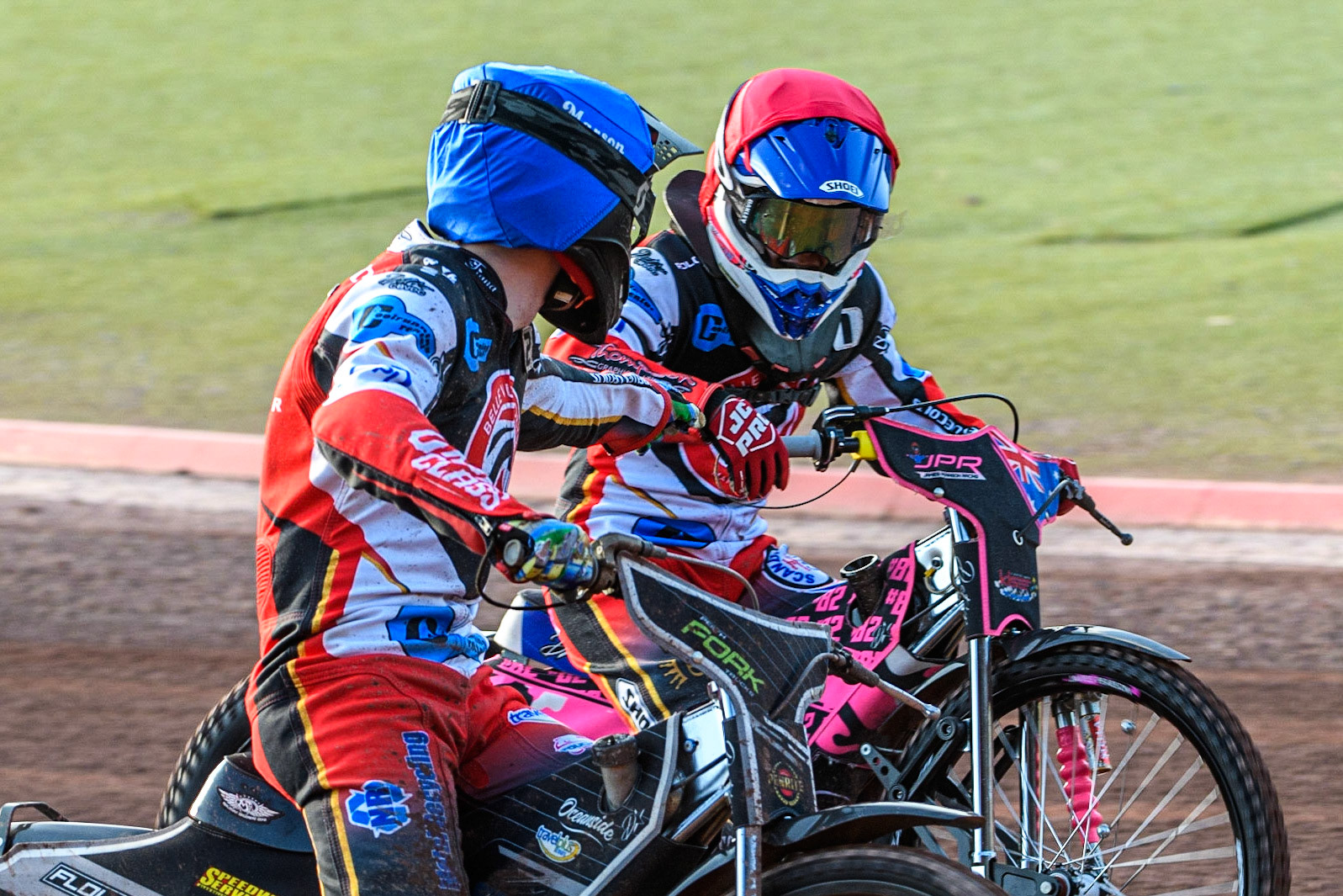 Matt Marson (Blue) and James Pearson (Red) celebrate their heat win during the National Development League match between Belle Vue Colts and Kent Royals at the National Speedway Stadium, Manchester on Friday 7th July 2023. (Photo: Ian Charles | MI News)