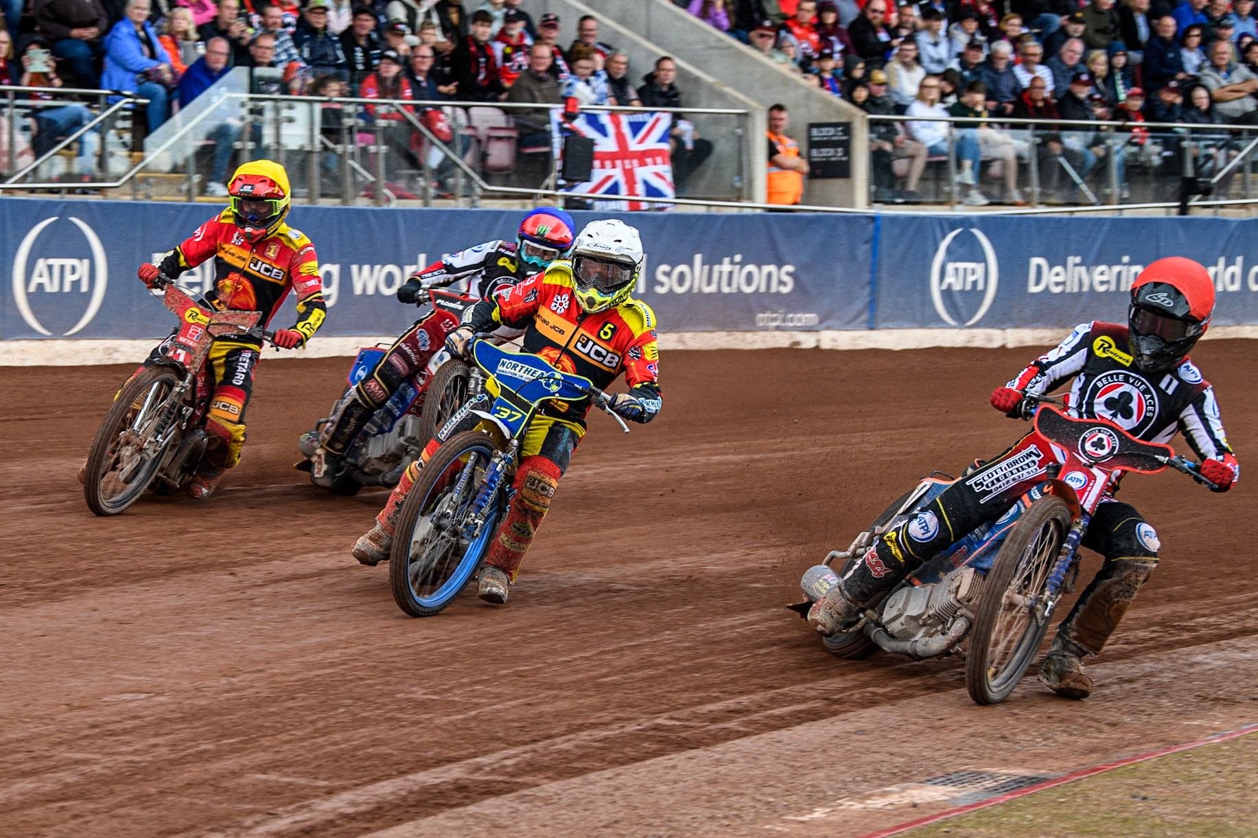 Brady Kurtz (Red) inside Chris Harris (White) Max Fricke (Yellow) with Dan Bewley (Blue) behind during the Sports Insure Premiership match between Belle Vue Aces and Leicester Lions at the National Speedway Stadium, Manchester on Monday 28th August 2023. (Photo: Ian Charles | MI News)