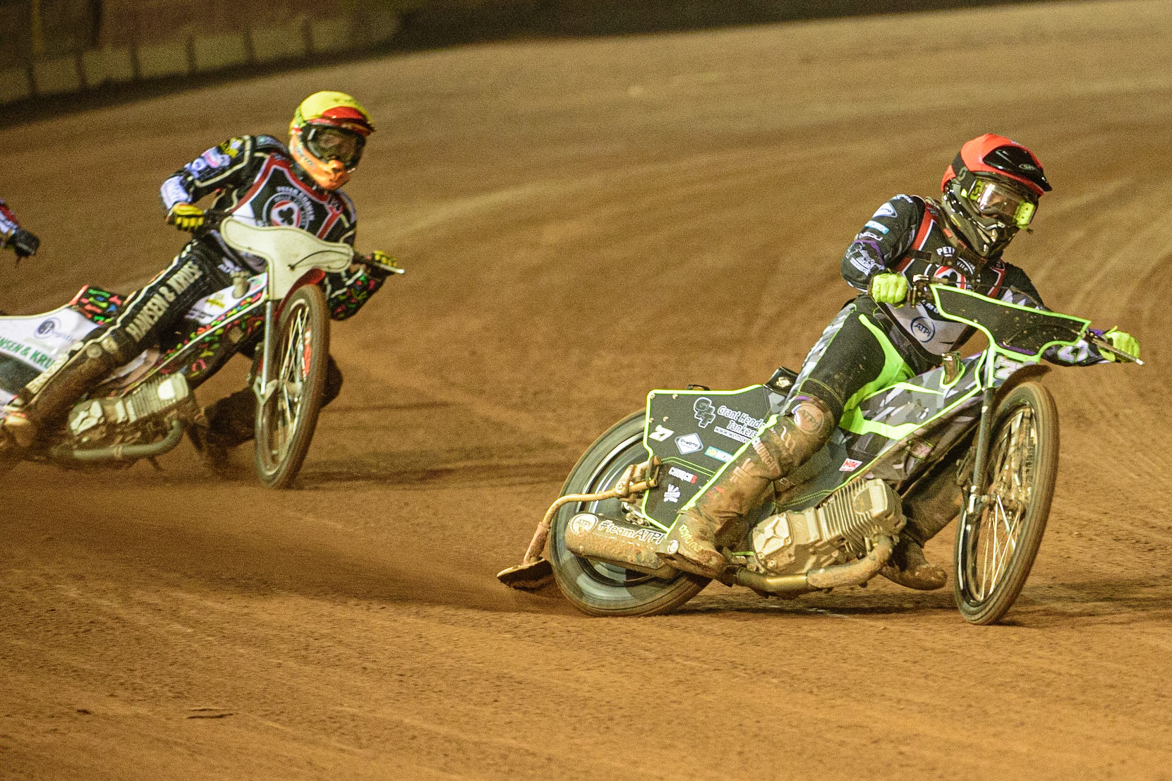 MANCHESTER, UK. MAR 21ST. Tom Brennan (Red) leads Niels-Kristian Iversen (Yellow) during the ATPI Peter Craven Memorial Trophy at the National Speedway Stadium, Manchester on Monday 21st March 2022. (Credit: Ian Charles | MI News)