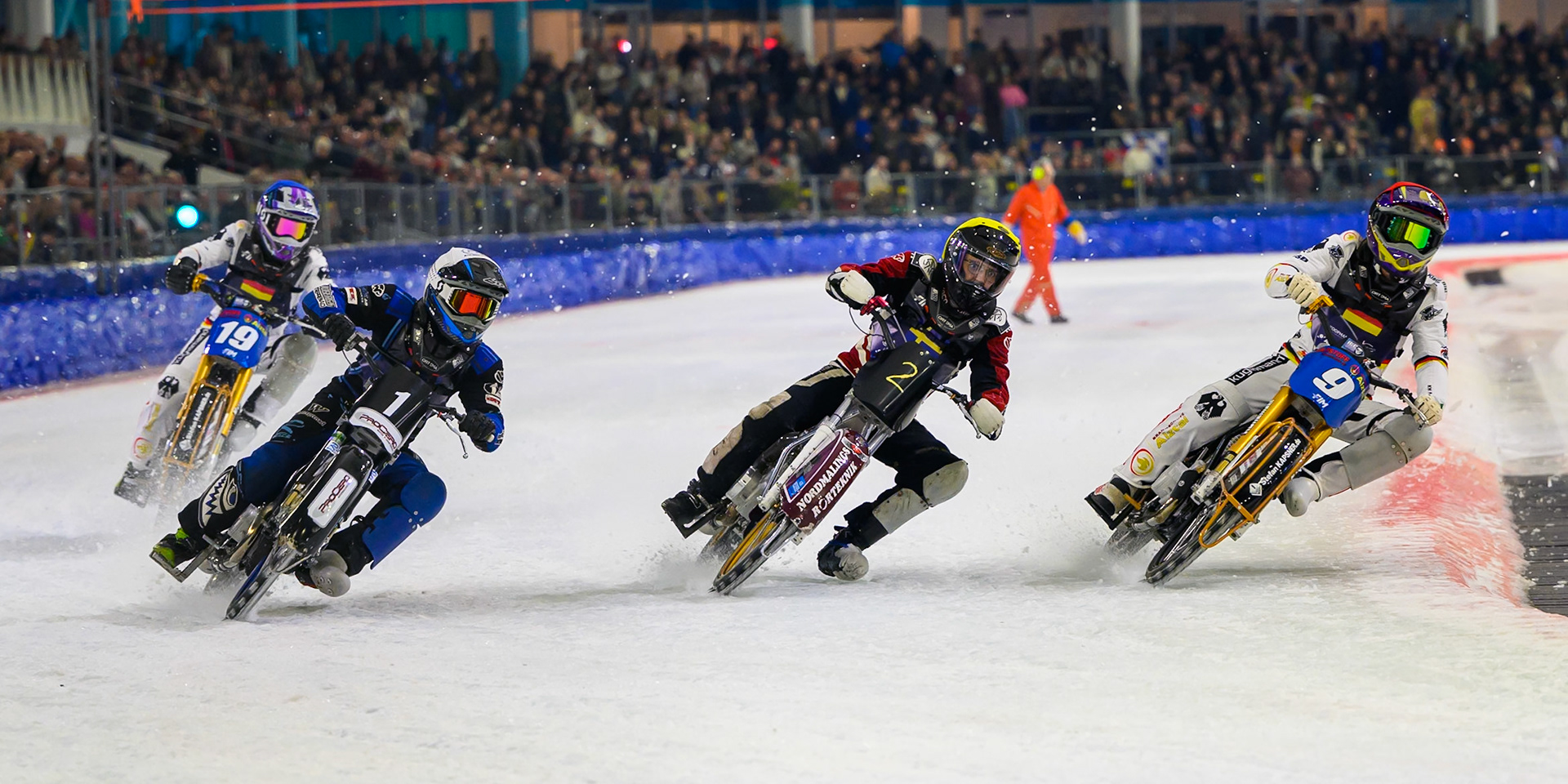 Germany v Sweden: (L to R) Niclas Svensson (1) of Sweden  in White Ove Ledstrom (2) of Sweden  in Yellow and Max Niedermaier (9) of Germany  in Red in the first turn with Maximillian Niedermaier (19) of Germany in Blue behind during the FIM Ice Speedway Of Nations at Ice Rink Thialf, Heerenveen on Sunday 12th April 2026. (Photo: Ian Charles | MI News)