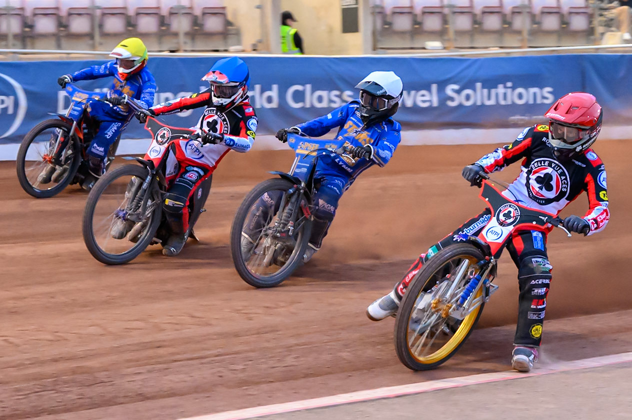 Jason Doyle of Belle Vue Aces in Red rides inside Ben Cook of Kings Lynn Stars in White Zach Cook of Belle Vue Aces in Blue and Jan Kvech of Kings Lynn Stars in Yellow  during the Rowe Motor Oil Premiership match between Belle Vue Aces and King's Lynn Stars at the National Speedway Stadium, Manchester on Monday 29th June 2026. (Photo: Ian Charles | MI News)
