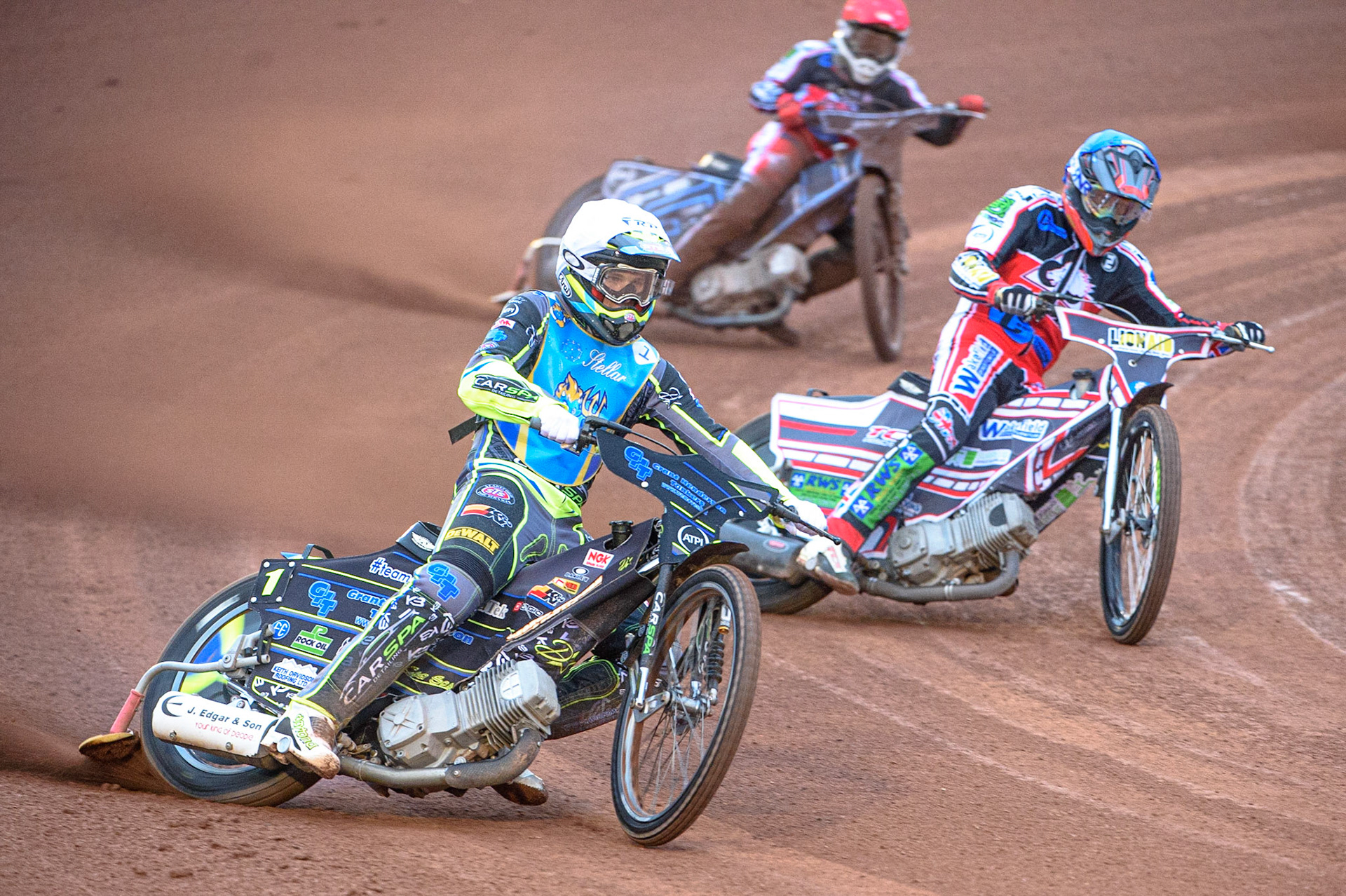 MANCHESTER, UK. AUGUST 20TH  Kyle Bickley  (White) leads Jack Parkinson-Blackburn  (Blue) and Sam McGurk  (Red) during the National Development League match between Belle Vue Aces and Armadale Devils at the National Speedway Stadium, Manchester on Friday 20th August 2021. (Credit: Ian Charles | MI News)