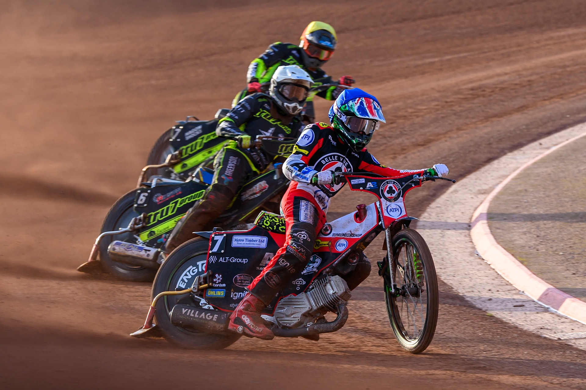 William Cairns of Belle Vue Aces in Blue leading Philip Hellstrom-Bangs of Ipswich Witches in White and Jason Edwards of Ipswich Witches in Yellow during the Rowe Motor Oil Premiership match between Belle Vue Aces and Ipswich Witches at the National Speedway Stadium, Manchester on Saturday 20th June 2026. (Photo: Ian Charles | MI News)