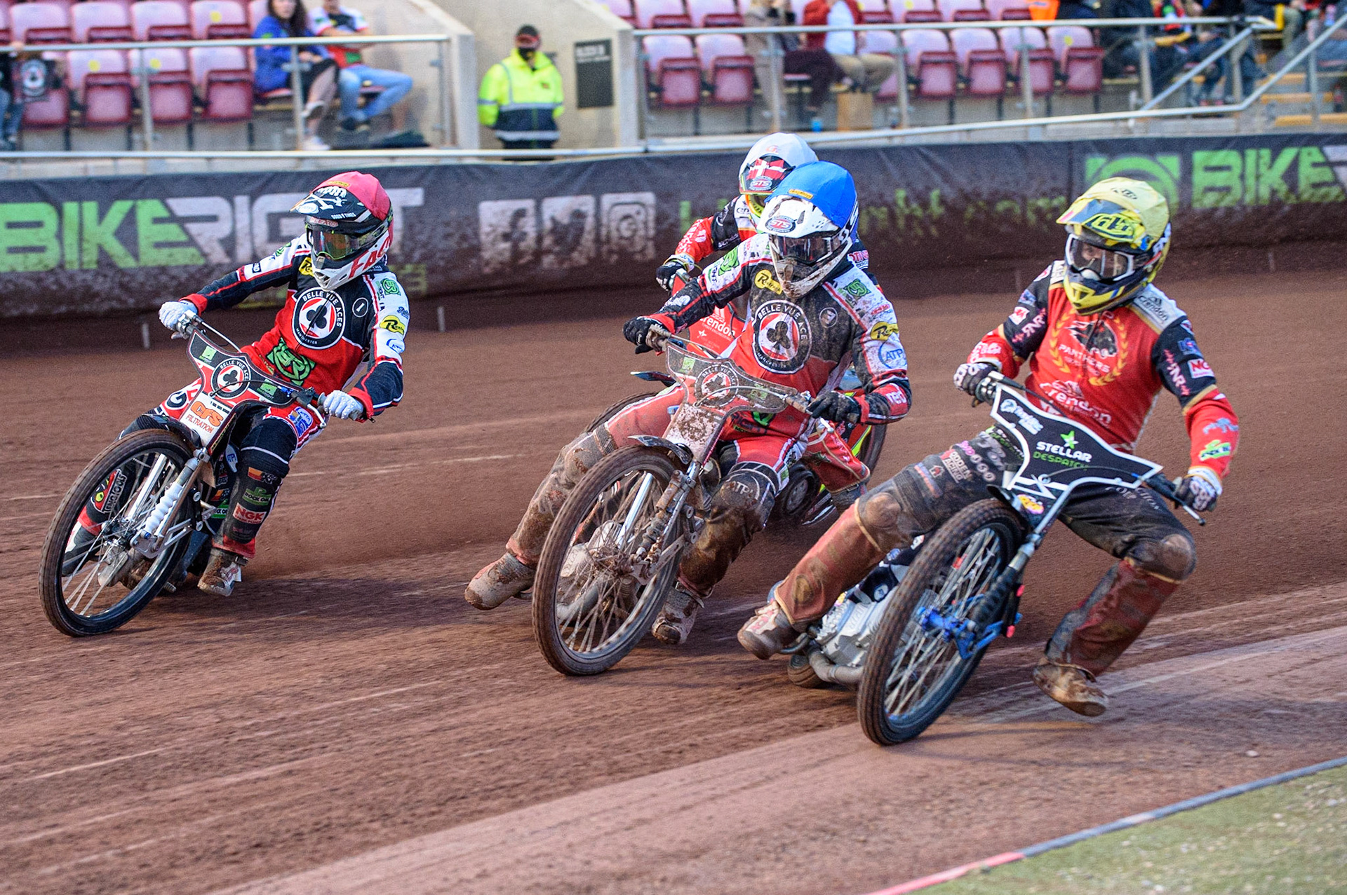 MANCHESTER, UK. AUG 9TH  Scott Nicholls  (Yellow) inside Richie Worrall  (Blue), Dan Bewley  (Red) with Michael Palm Toft  (White) behind during the SGB Premiership match between Belle Vue Aces and Peterborough at the National Speedway Stadium, Manchester on Monday 9th August 2021. (Credit: Ian Charles | MI News)