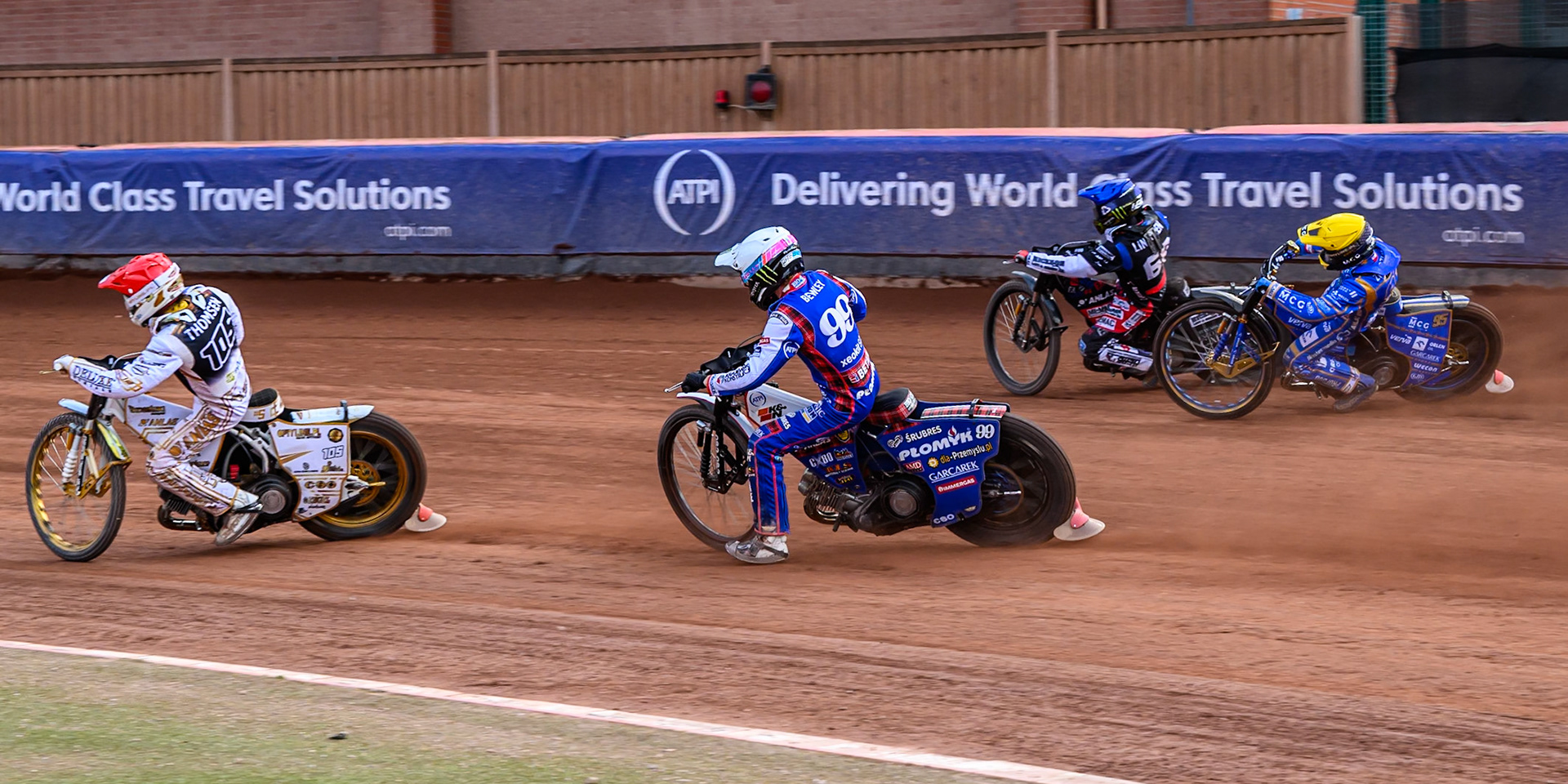 Anders Thomsen (105) of Denmark in Red leading Dan Bewley (99) of Great Britain in White, Fredrik Lindgren (66) of Sweden in Blue and Bartosz Zmarzlik (95) of Poland in Yellow during the ATPI FIM Speedway Grand Prix Round 4 at the National Speedway Stadium, Manchester, on Friday 13th June 2025. (Photo: Ian Charles | MI News)