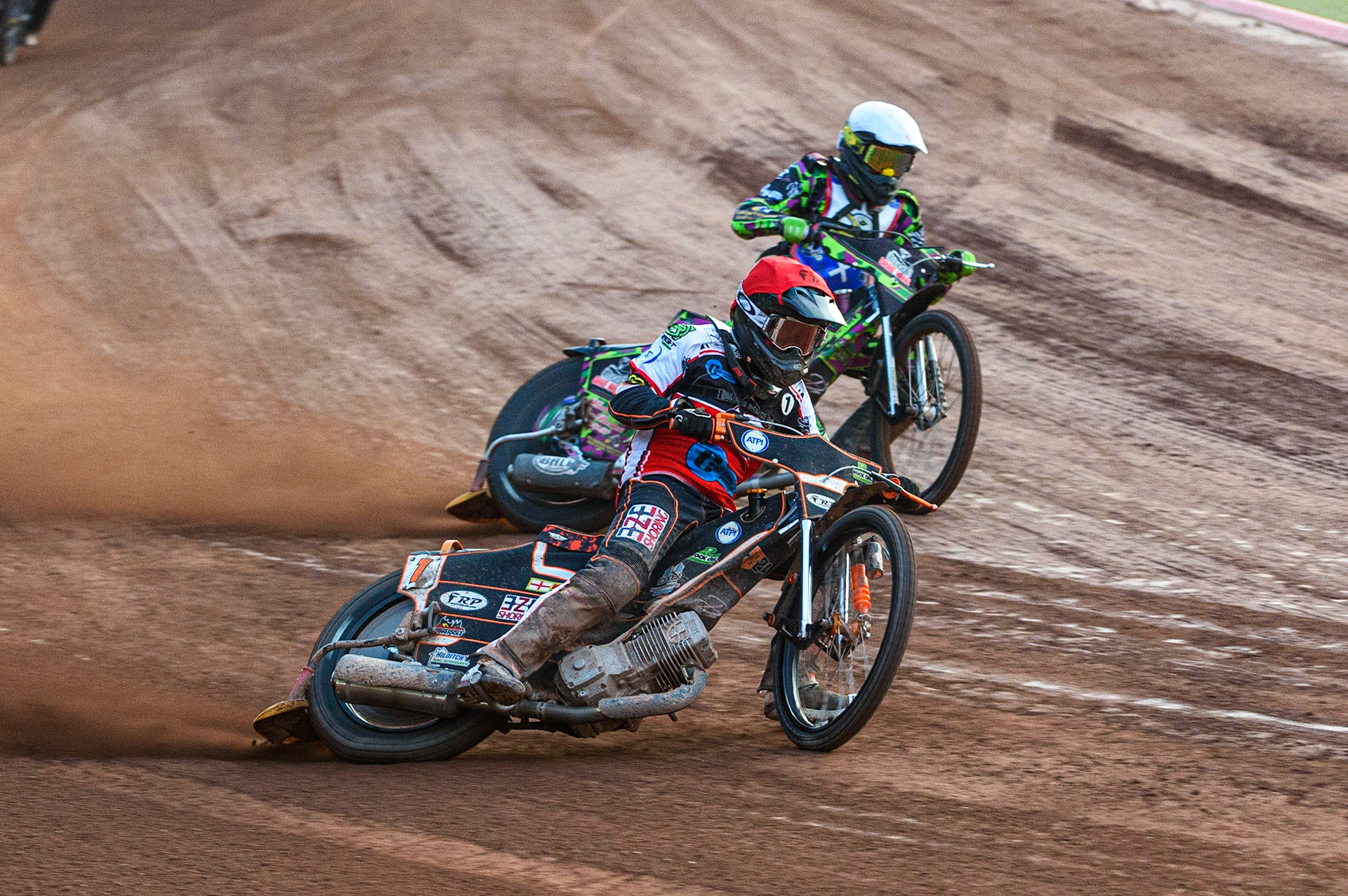 MANCHESTER, UK. JULY 23RD  Jack Smith  (Red) leads Richard Andrews  (Blue)during the National Development League match between Belle Vue Colts and Eastbourne Seagulls at the National Speedway Stadium, Manchester on Friday 23rd July 2021. (Credit: Ian Charles | MI News)