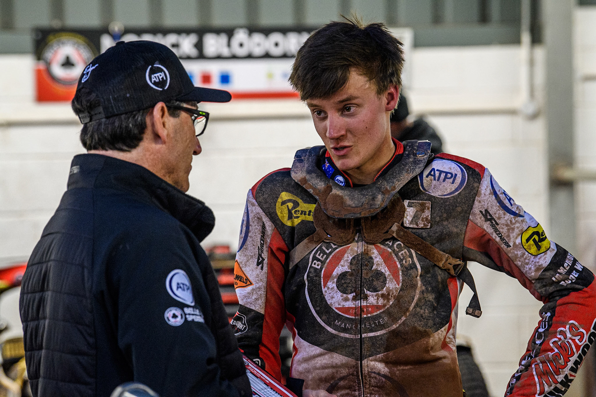 Belle Vue Aces' Team Manager Mark Lemon  (Left) chats with Belle Vue Aces' Connor Bailey during the Rowe Motor Oil Premiership match between Belle Vue Aces and Ipswich Witches at the National Speedway Stadium, Manchester on Monday 22nd April 2024. (Photo: Ian Charles | MI News)