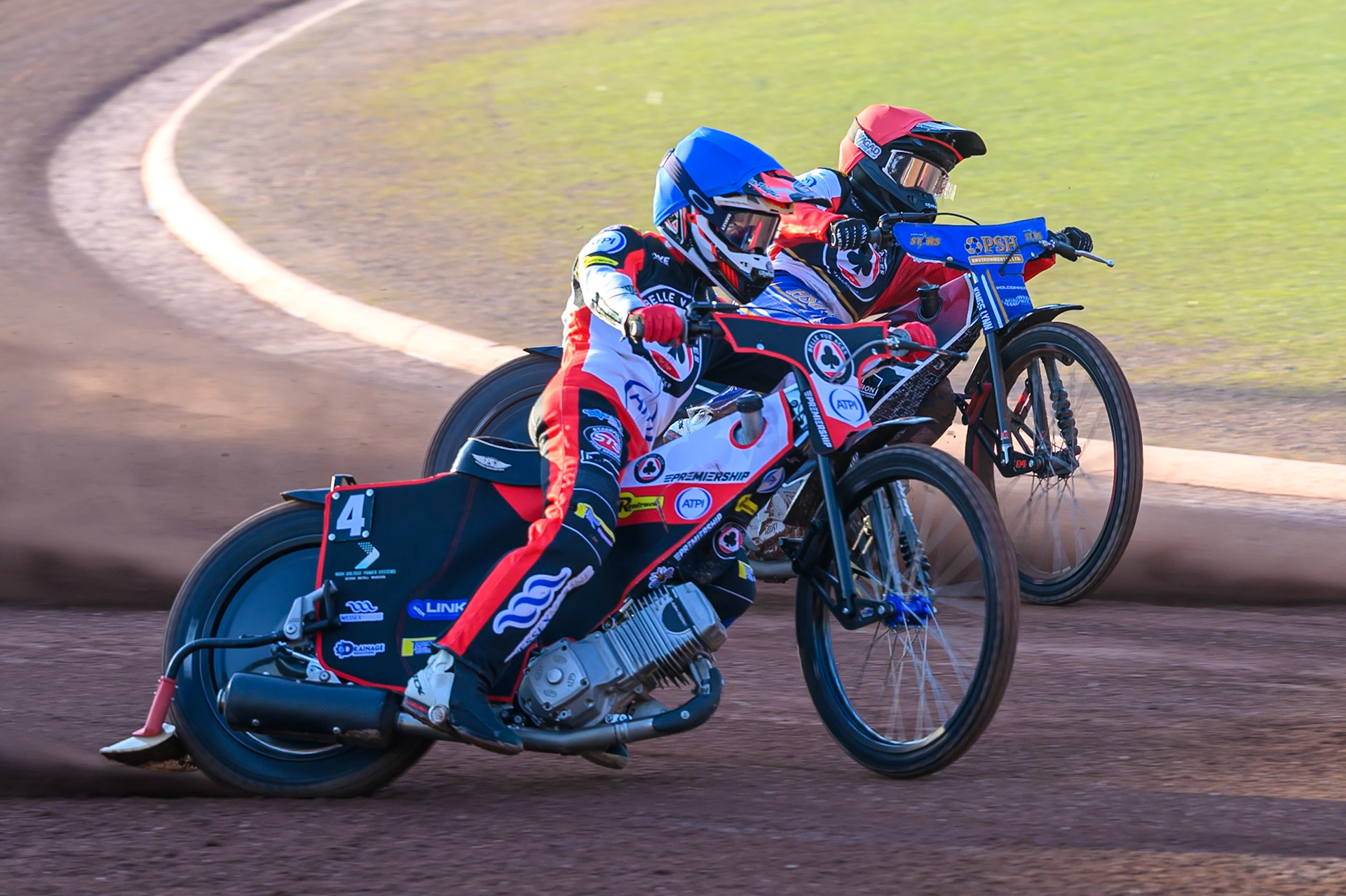 Zach Cook of Belle Vue Aces on the outside of Ben Cook, Guest Rider for Belle Vue Aces in Red during the Rowe Motor Oil Premiership match between Belle Vue Aces and Northampton Foxes at the National Speedway Stadium, Manchester on Monday 13th July 2026. (Photo: Ian Charles | MI News)
