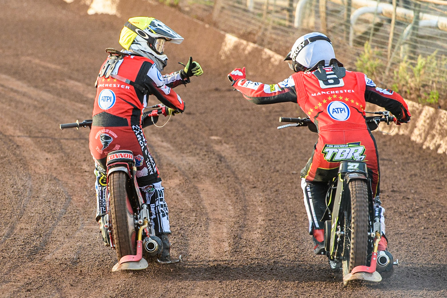 Connor Bailey (Yellow) and Tom Brennan (White) celebrate after their maximum points heat win during the Sports Insure Premiership match between Sheffield Tigers and Belle Vue Aces at Owlerton Stadium, Sheffield on Thursday 20th July 2023. (Photo: Ian Charles | MI News)
