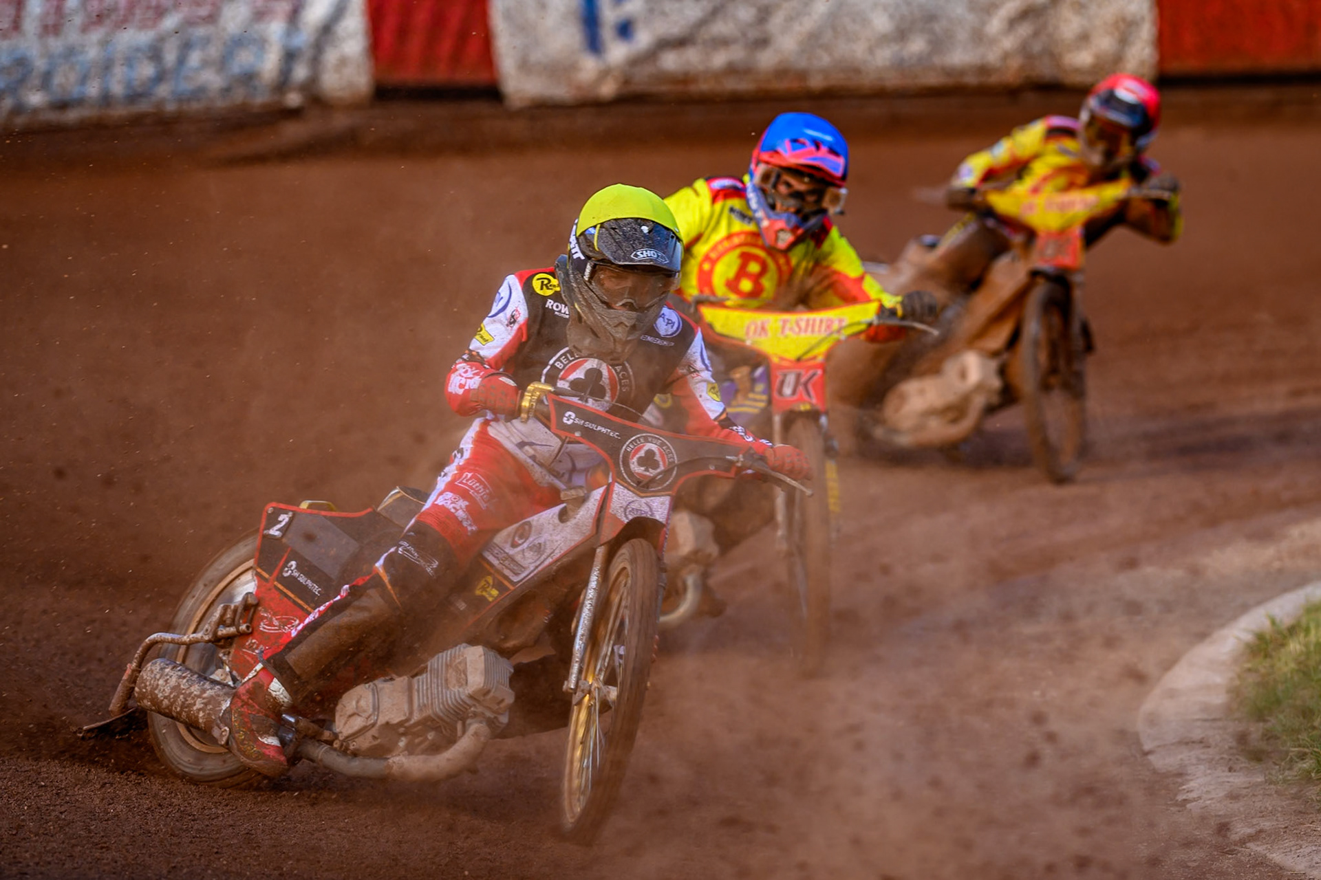 Belle Vue Aces' Norick Blodorn in Yellow leading Birmingham Brummies' Paco Castagna in Blue and Birmingham Brummies' Tobiasz Musielak in Red during the Rowe Motor Oil Premiership match between Birmingham Brummies and Belle Vue Aces at Perry Bar Stadium, Birmingham on Monday 2nd June 2025. (Photo: Ian Charles | MI News)