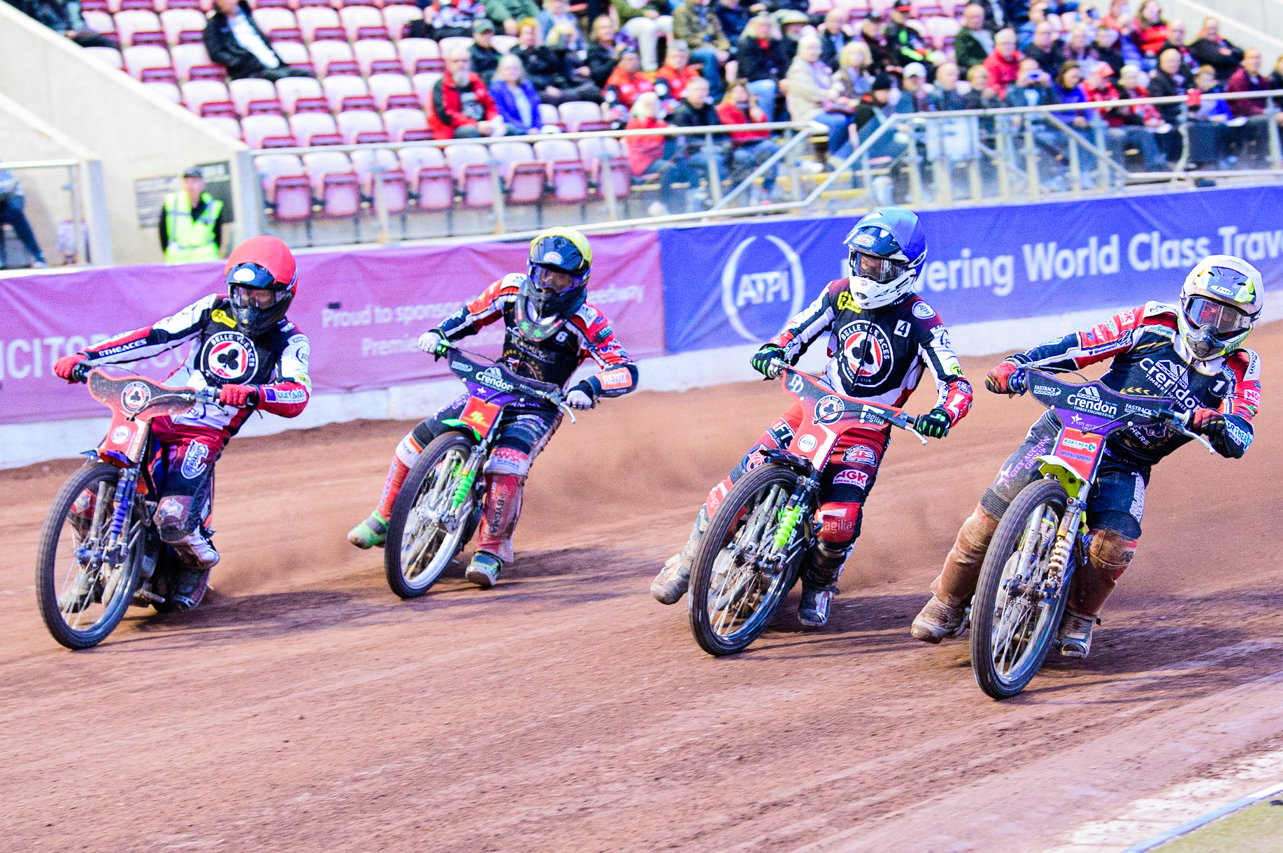 Chris Harris  (White) inside Charles Wright (Blue) Benjamin Basso (Yellow) and Brady Kurtz (Red) during the SGB Premiership match between Belle Vue Aces and Peterborough at the National Speedway Stadium, Manchester on Monday 25th July 2022. (Credit: Ian Charles | MI News