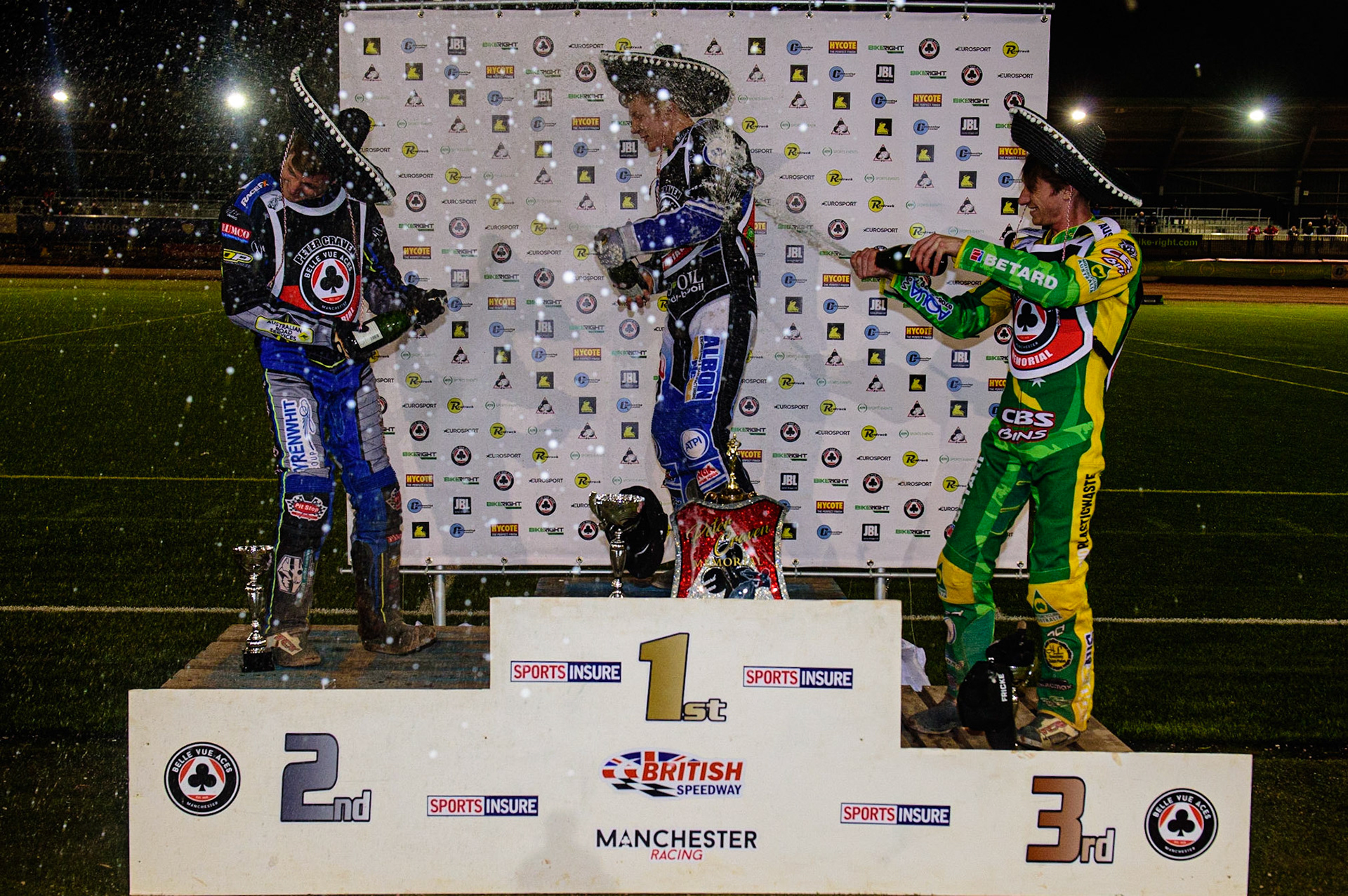 MANCHESTER, UK. OCT 23RD  Top three spray the champagne during the Peter Craven Memorial Trophy event at the National Speedway Stadium, Manchester on Saturday 23rd October 2021. (Credit: Ian Charles | MI News)