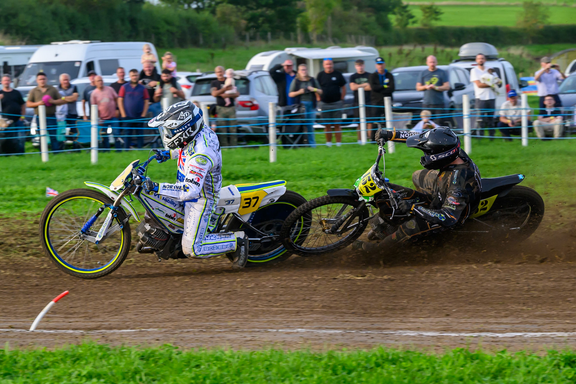 British Masters (Solos): Ashton Vale (152) catches the back wheel of Chris Harris (37)  and comes off during the British Masters Grasstrack Championship at Lower Marsh Farm, Much Hoole, Preston in Lancashire, England on Sunday 13th September 2026. (Photo: Ian Charles | MI News)