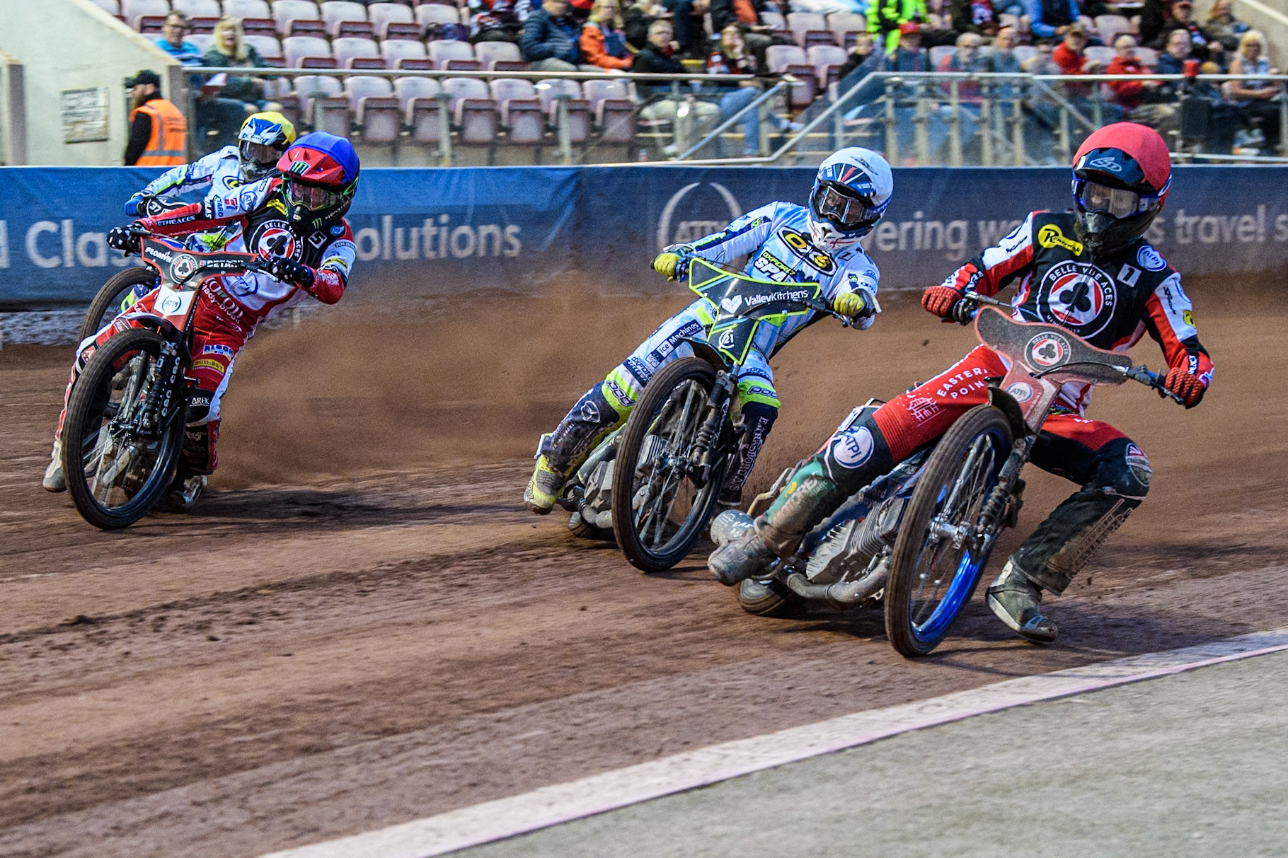 Belle Vue Aces' Brady Kurtz  in Red rides inside Oxford Spires' Rohan Tungate  in White, Belle Vue Aces' Dan Bewley  in Blue and Oxford Spires' Chris Harris   in Yellow during the Rowe Motor Oil Premiership match between Belle Vue Aces and Oxford Spires at the National Speedway Stadium, Manchester on Monday 22nd July 2024. (Photo: Ian Charles | MI News)