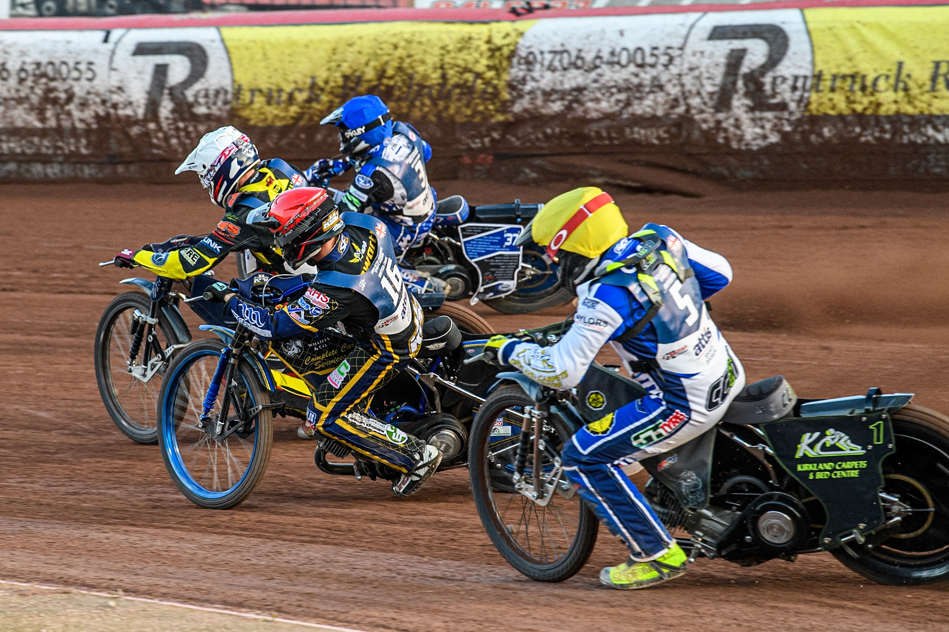 Craig Cook in Yellow chases Kyle Howarth in Red, Steve Worrall in White and Chris Harris in Blue during the Attis Insurance Sports Division British Speedway Championship Final at the National Speedway Stadium, Manchester on Saturday 8th June 2024. (Photo: Ian Charles | MI News)