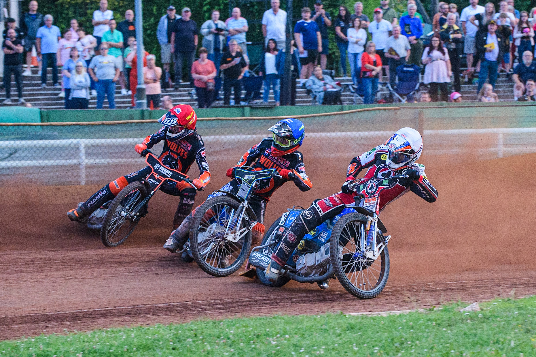 WOLVERHAMPTON, UK. JULY 26TH Steve Worrall  (White) inside Ryan Douglas (Blue) and Sam Masters  (Red) during the SGB Premiership match between Wolverhampton Wolves and Belle Vue Aces at the Ladbroke Stadium, Wolverhampton on Monday 26th July 2021. (Credit: Ian Charles | MI News)