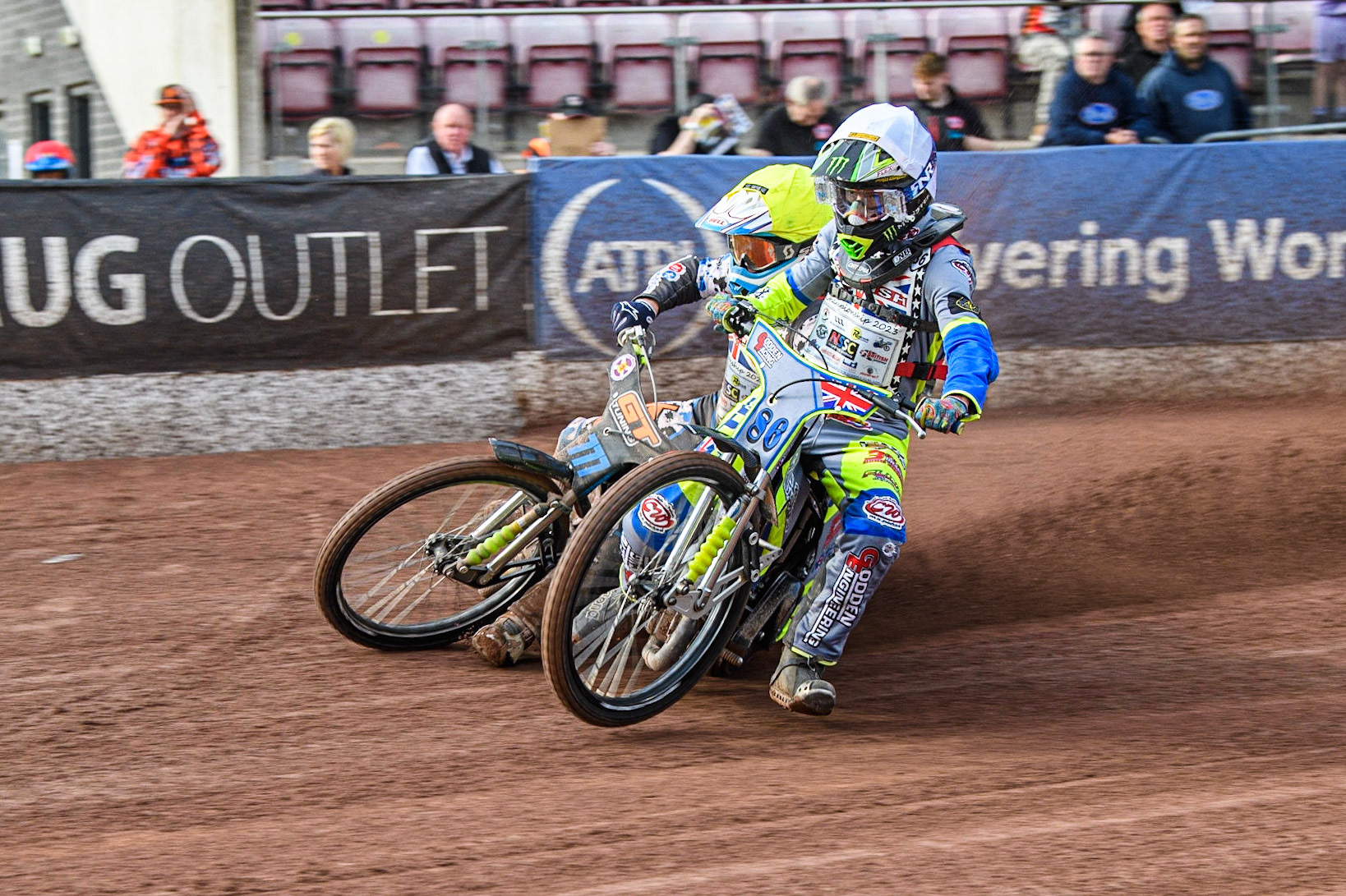 Sonny Springer (White) collides with Billy Budd (Yellow) and causes Budd to fall during the British Youth Speedway Championships at the National Speedway Stadium, Manchester on Friday 21st July 2023. (Photo: Ian Charles | MI News)