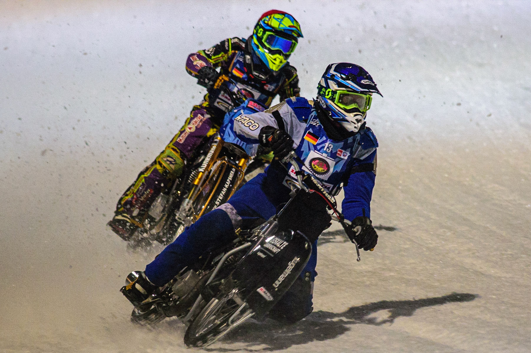 Reinhard Greisel (Blue) leads Maximillian Neidermaier (Red) during the German Individual Ice Speedway Championship at Horst-Dohm-Eisstadion, Berlin on Friday 3rd March 2023. (Photo: Ian Charles | MI News)