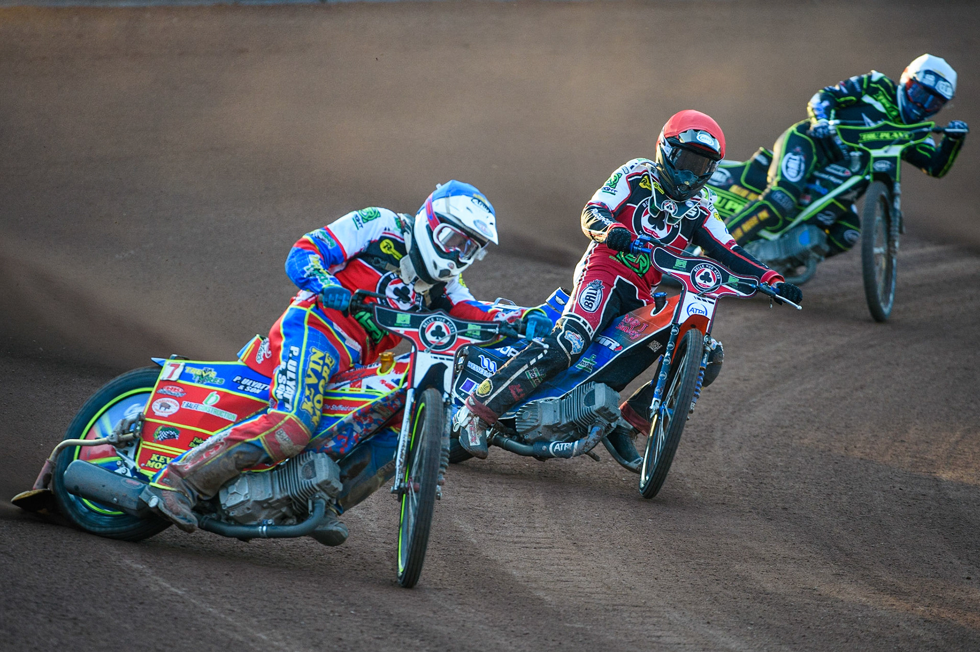 MANCHESTER UKSimon Lambert(Blue) leads Brady Kurtz   (Red) and Jake Allen  (White) during the SGB Premiership match between Belle Vue Aces and Ipswich Witches at the National Speedway Stadium, Manchester on Monday 2nd August 2021. (Credit: Ian Charles | MI News)