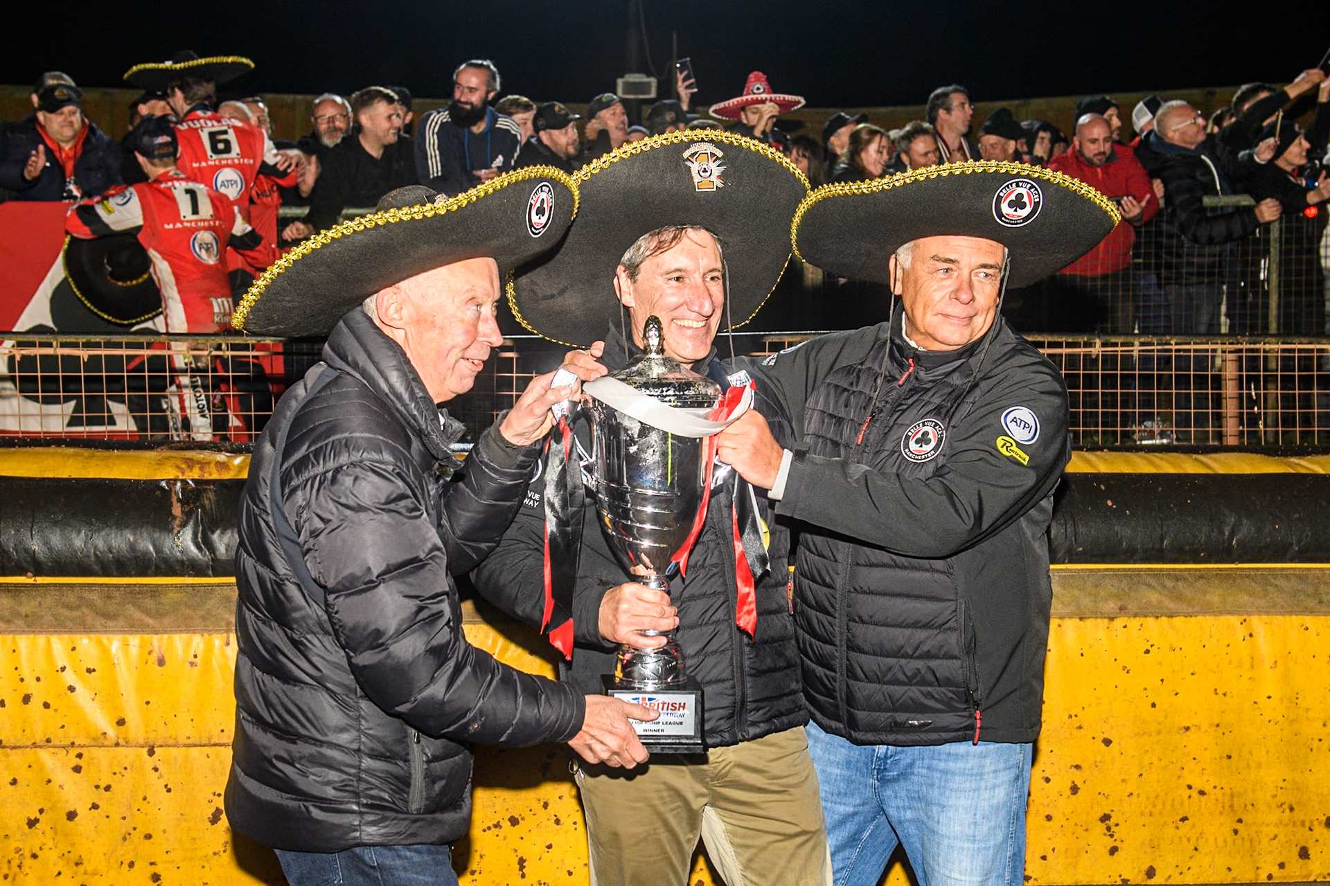 (L to R) Tony Rice, Mark Lemon and Robin Southwell with the Premiership Trophy during the Rowe Motor Oil Premiership Grand Final 2nd Leg between Leicester Lions and Belle Vue Aces at the Pidcock Motorcycles Arena, Leicester on Thursday 26th September 2024. (Photo: Ian Charles | MI News)