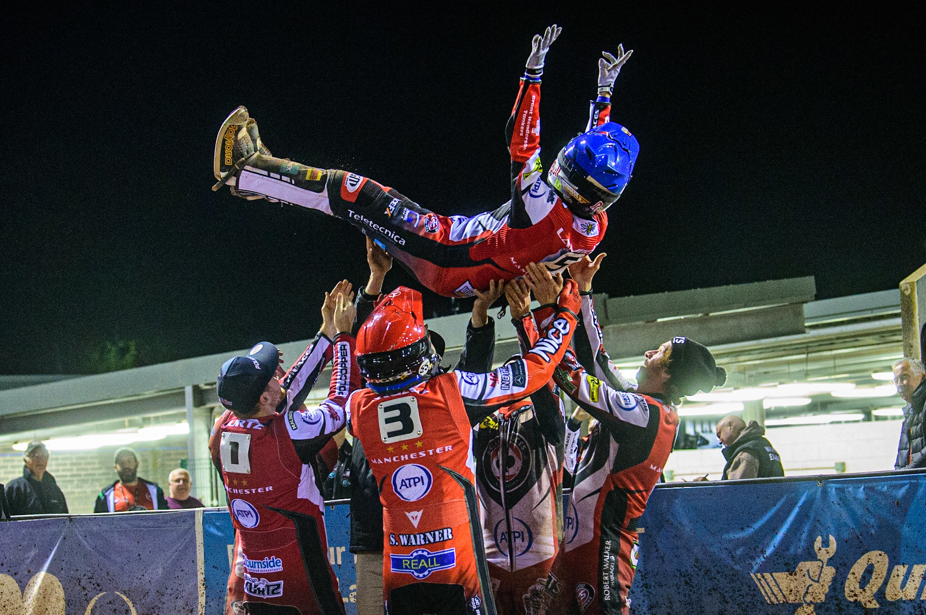 Robert Lambert is given the bumps by his team mates after his 15 point maximum on his debut Belle Vue ATPI Aces  during the SGB Premiership Semi Final 2nd Leg between Belle Vue Aces and Ipswich Witches at the National Speedway Stadium, Manchester on Monday 3rd October 2022. (Credit: Ian Charles | MI News)