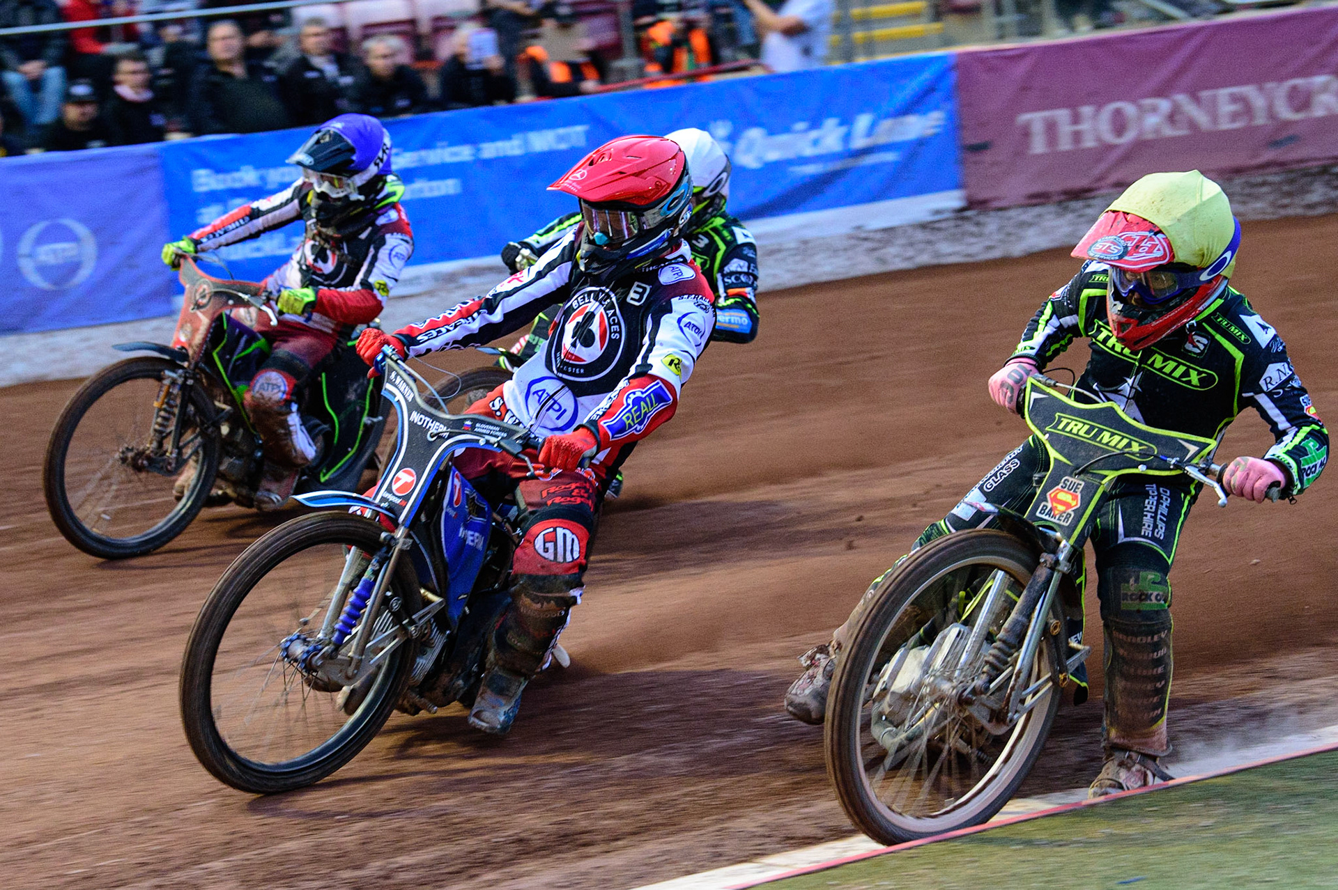 MANCHESTER, UK. JUN 6TH  Matej Žagar  (Red) leads Ben Barker  (Yellow) Danny King  (White) and Tom Brennan  (Blue) during the SGB Premiership match between Belle Vue Aces and Ipswich Witches at the National Speedway Stadium, Manchester on Monday 6th June 2022. (Credit: Ian Charles | MI News)