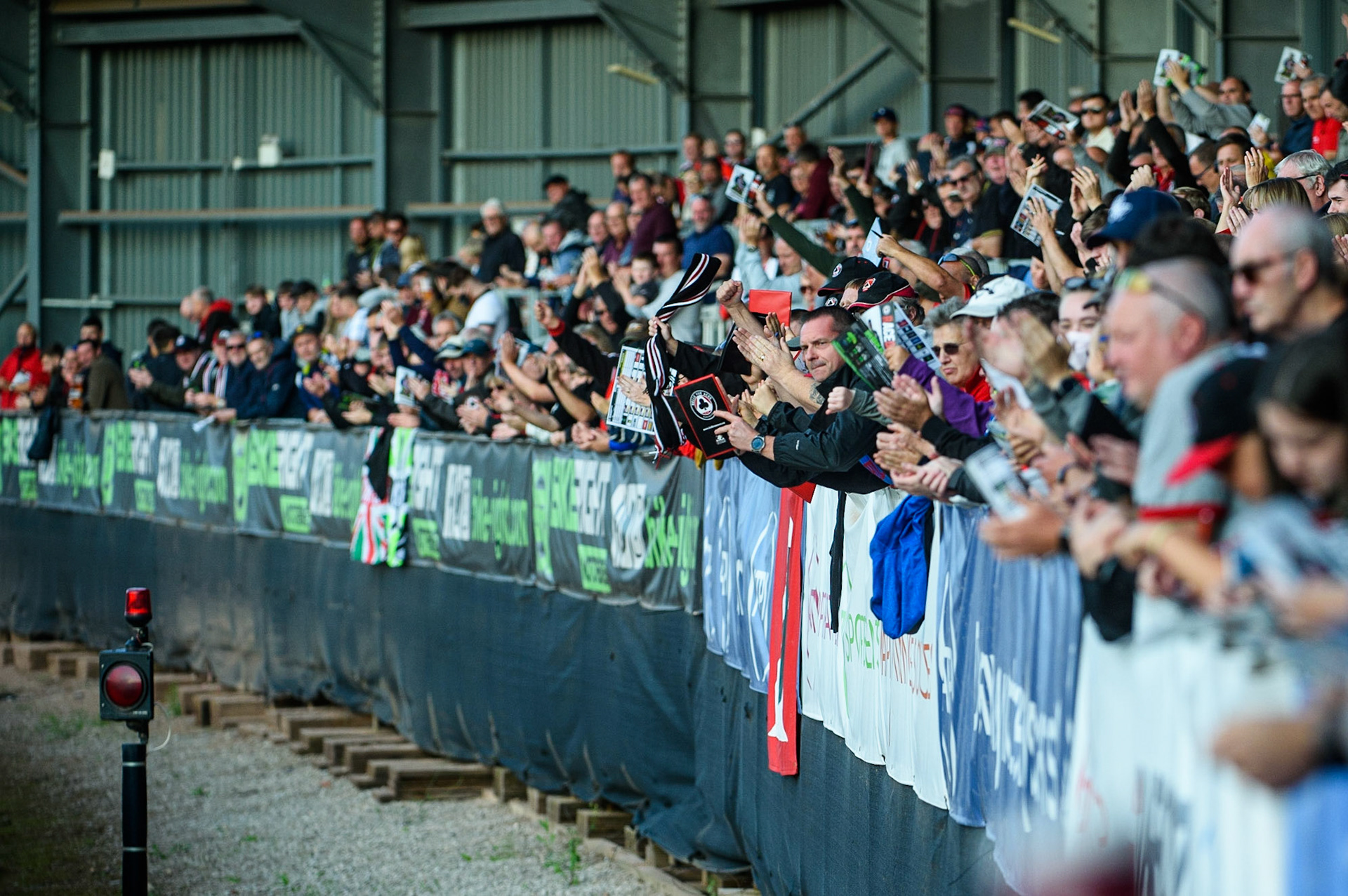 MANCHESTER UKThe Back straight fans cheer the Aces during the SGB Premiership match between Belle Vue Aces and Ipswich Witches at the National Speedway Stadium, Manchester on Monday 2nd August 2021. (Credit: Ian Charles | MI News)