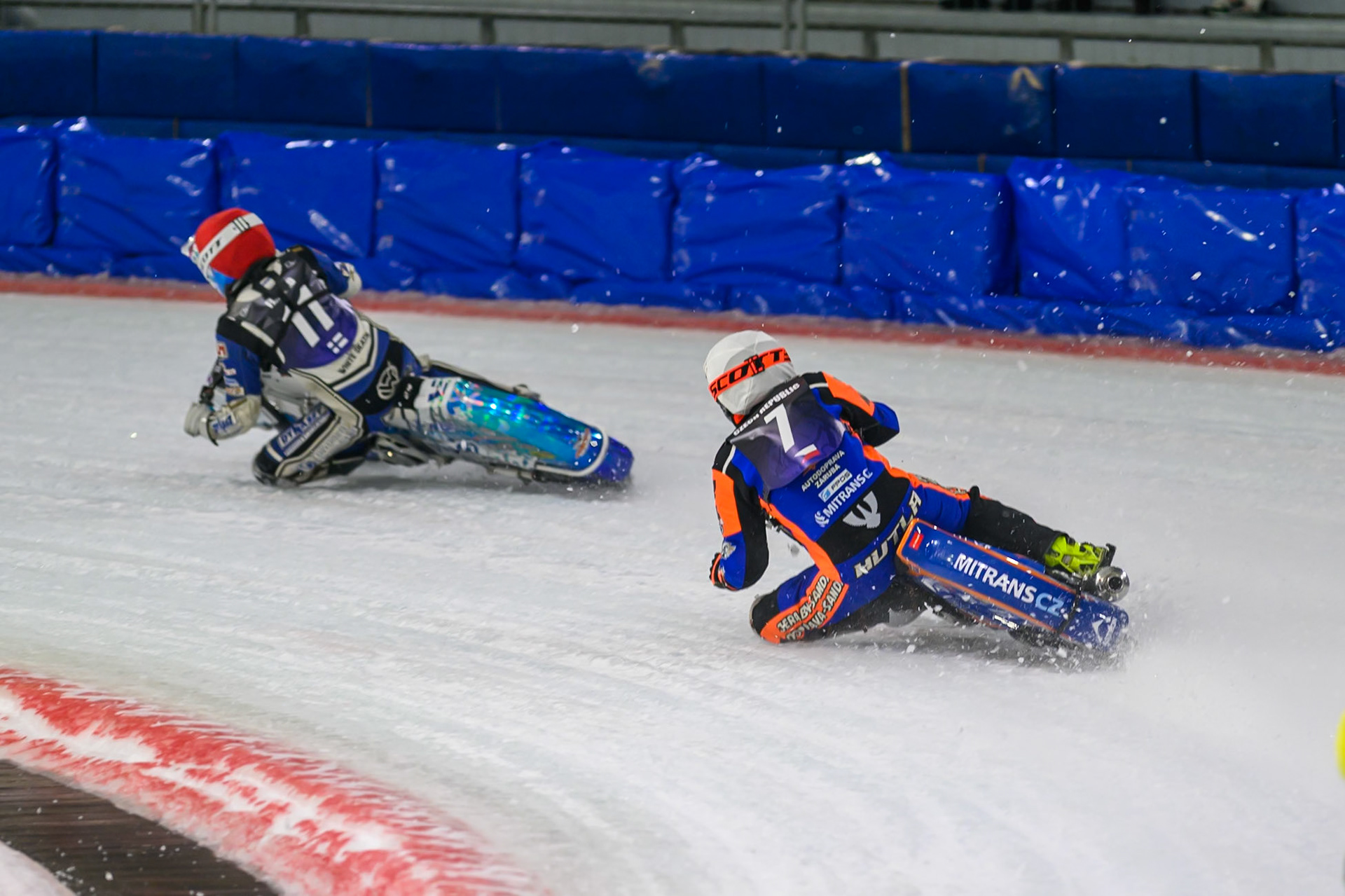 Lukáš Hutla (7) of Czechia  in White \v\ Max Koivula (11) of Finland  in Red during the FIM Ice Speedway Of Nations at Ice Rink Thialf, Heerenveen on Sunday 12th April 2026. (Photo: Ian Charles | MI News)