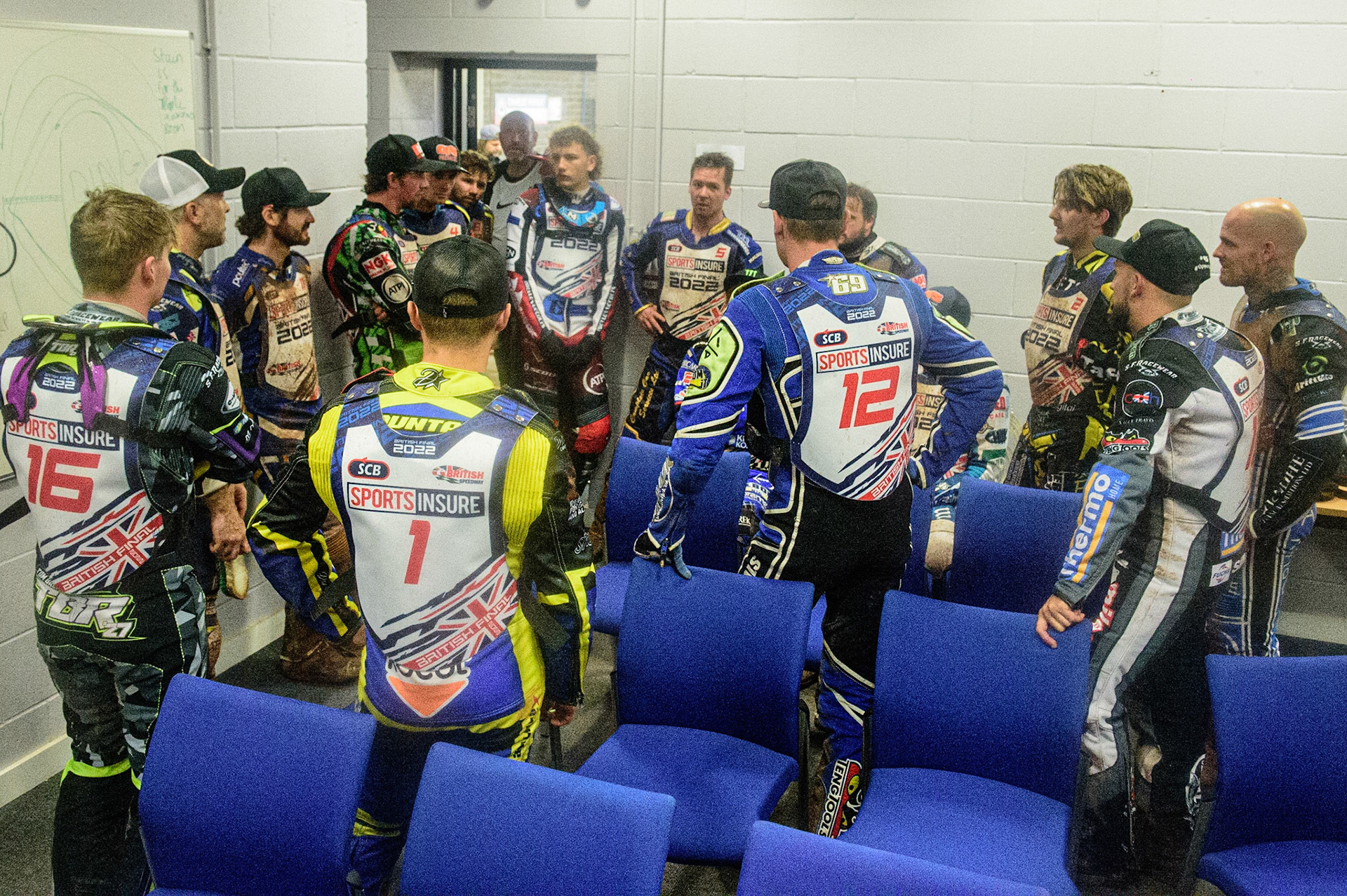 The riders hold a meeting after heat 12 during the Sports Insure British Speedway Championship Final at the National Speedway Stadium, Bellevue, Manchester, England on Monday 1st August 2022. (Photo by: Ian Charles | MI News)