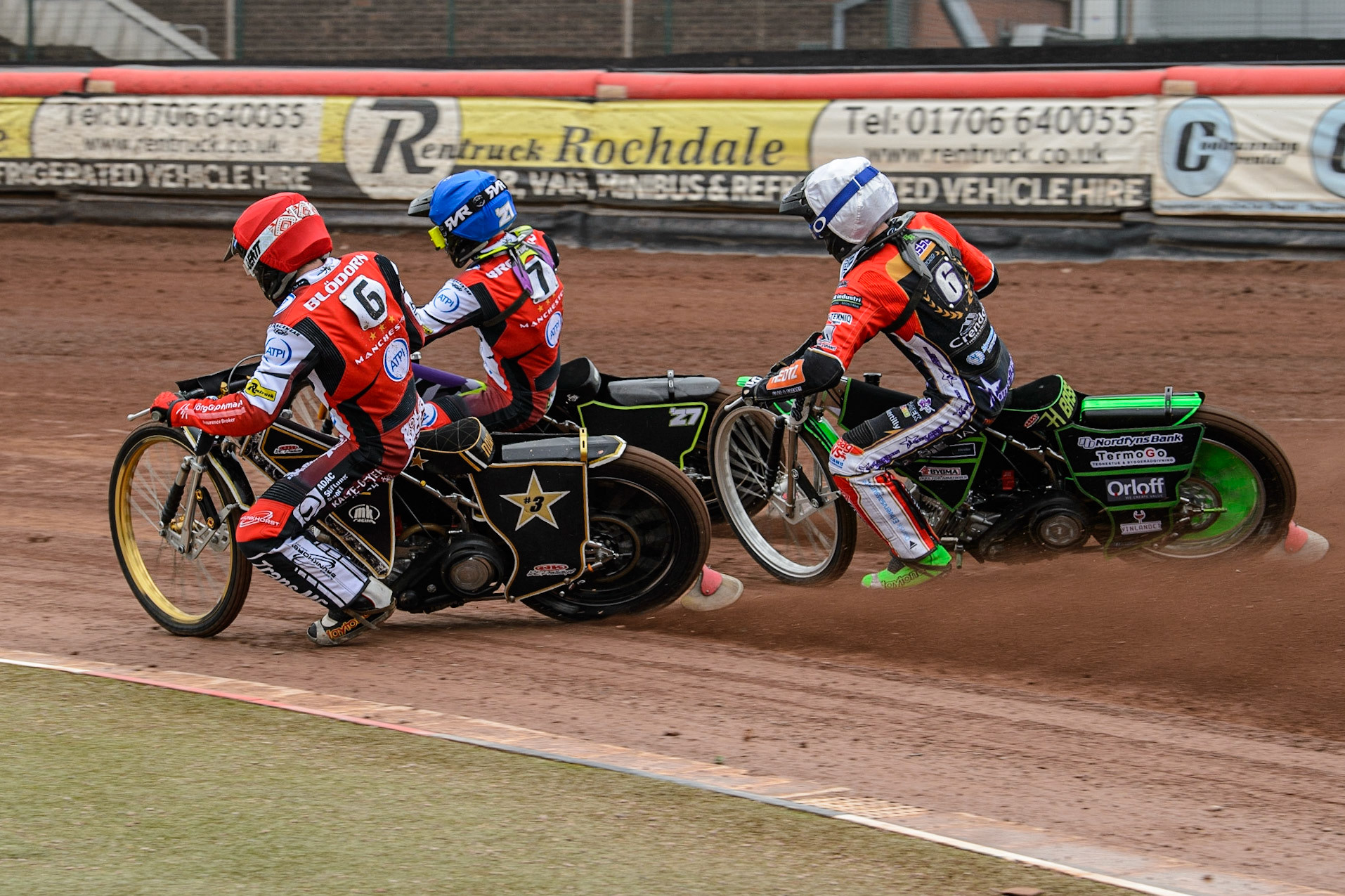MANCHESTER, UK. MAY 2ND  Norick Blödorn  (Red) and Tom Brennan  (Blue) lead Benjamin Basso (White) during the SGB Premiership match between Belle Vue Aces and Peterborough at the National Speedway Stadium, Manchester on Monday 2nd May 2022. (Credit: Ian Charles | MI News)
