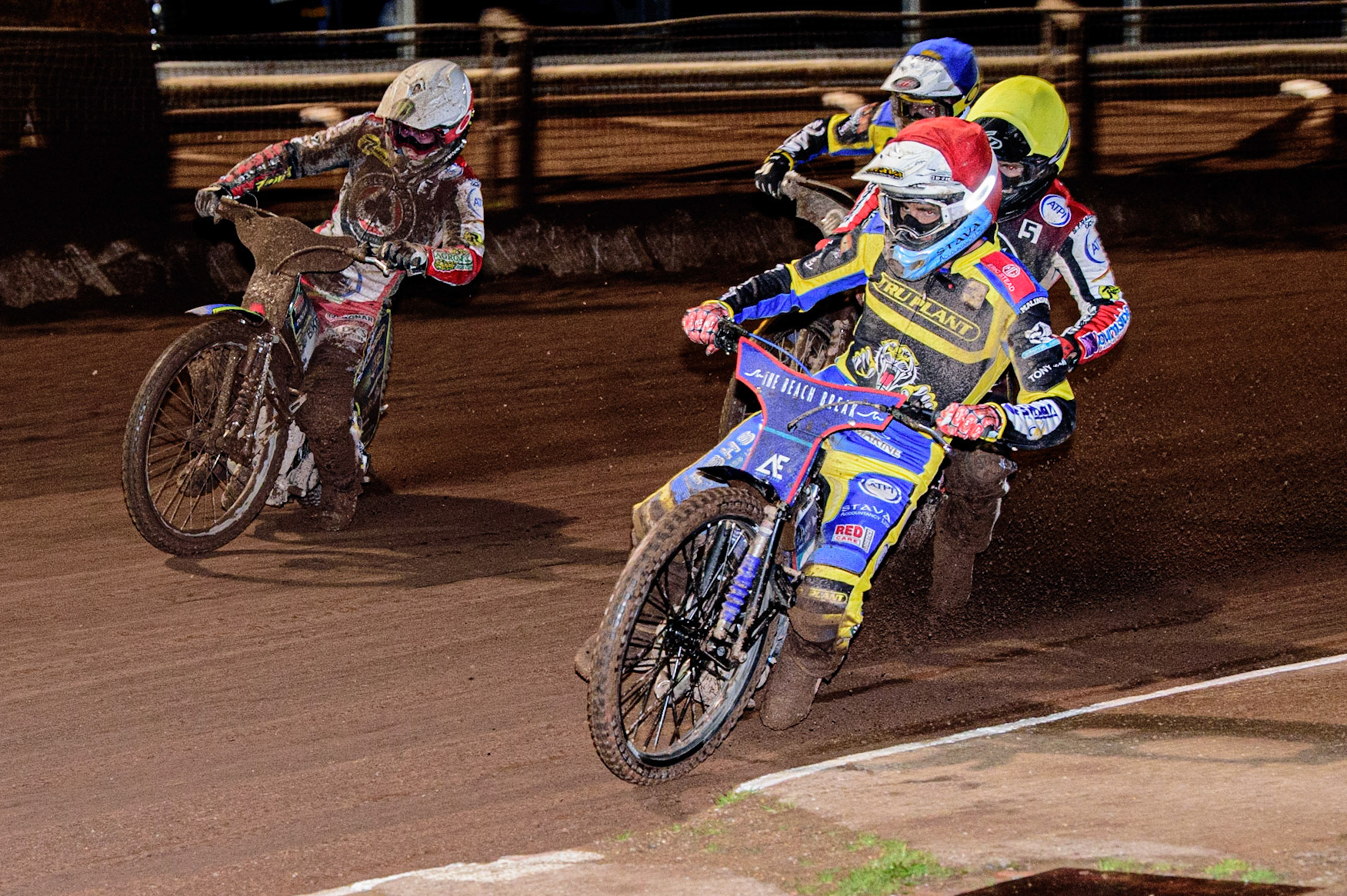 Adam Ellis  (Red) leads Jaimon Lidsey  (White) Brady Kurtz  (Yellow) and Lewis Kerr (Blue) during the Sheffield Tigers vs Belle Vue Aces meeting in the SGP Premiership at Owlerton Stadium, Sheffield on Thursday 23rd March 2023. (Photo: Ian Charles | MI News)