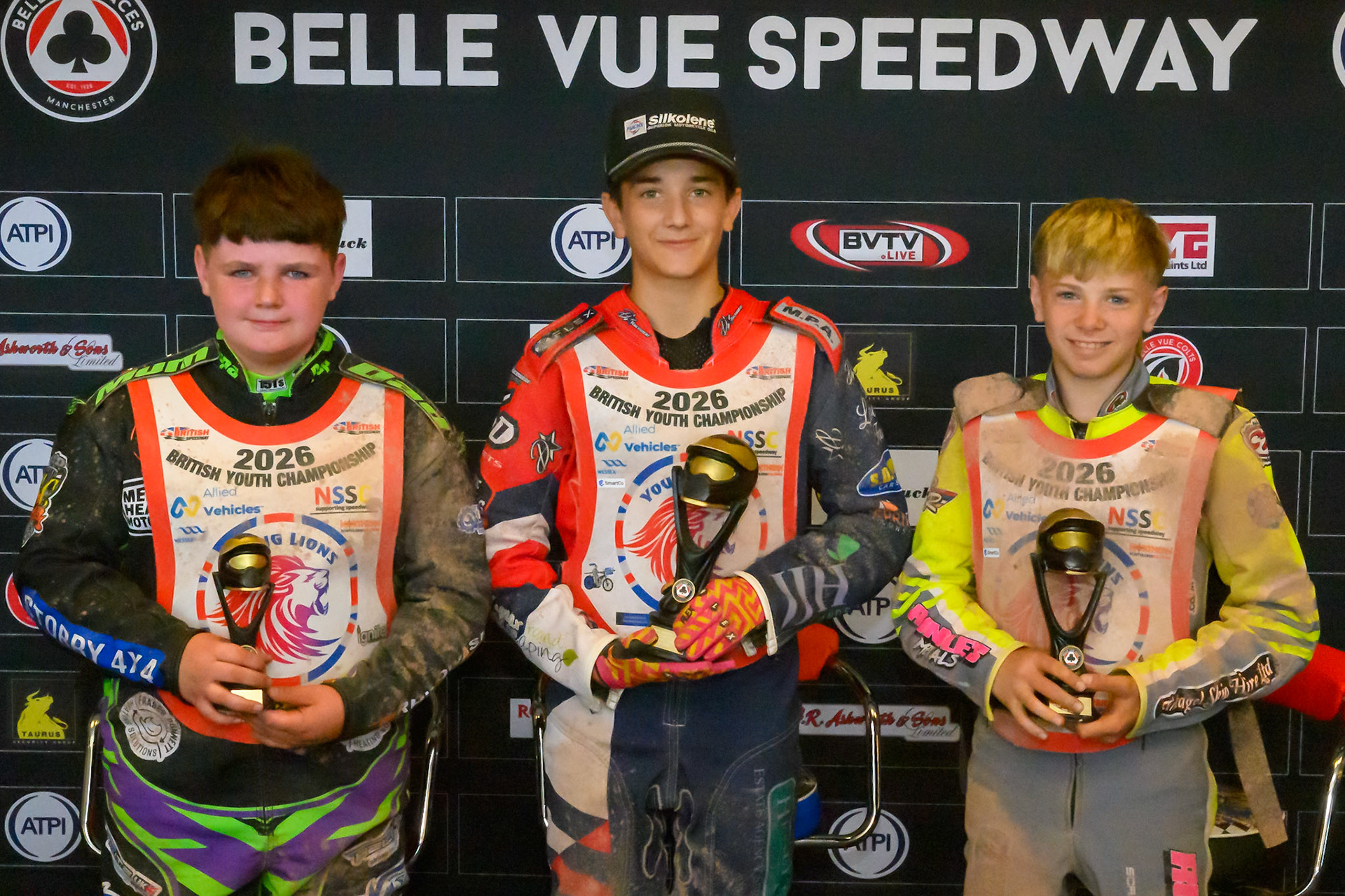 BRITISH YOUTH CHAMPIONSHIP 125cc TOP 3: (L to R) Lewis Hague (322) (3rd), Fraser Buckle (555)  (Winner) George Climo (83) (2nd) during the British Youth Championship (125cc) at the National Speedway Stadium, Manchester on Sunday 19th July 2026. (Photo: Ian Charles | MI News)