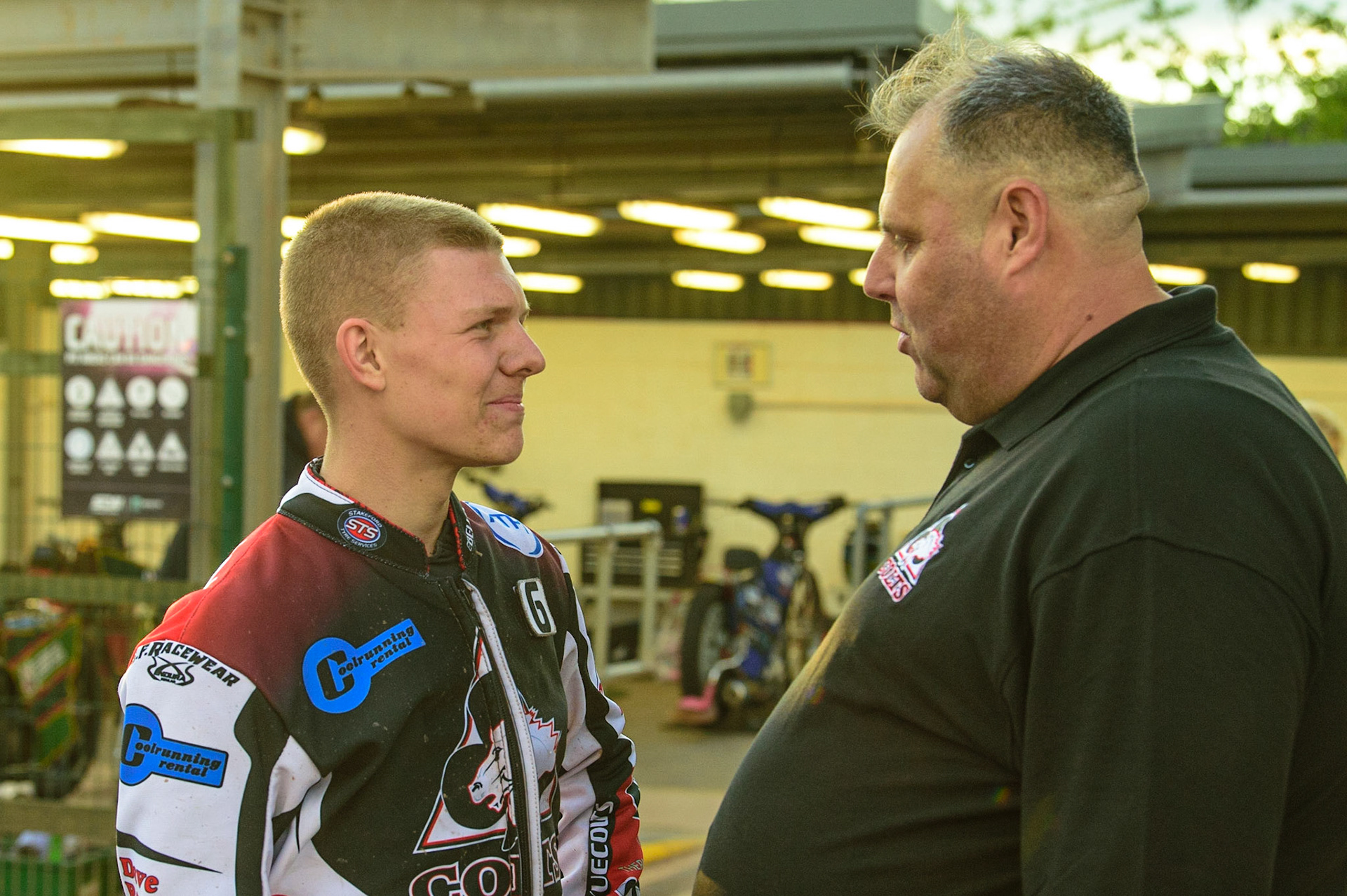 Archie Freeman  (left) with Belle Vue Cool Running Colts team manager Steve Williams during the National Development League match between Belle Vue Colts and Mildenhall Fens Tigers at the National Speedway Stadium, Manchester on Friday 15th July 2022. (Credit: Ian Charles | MI News)